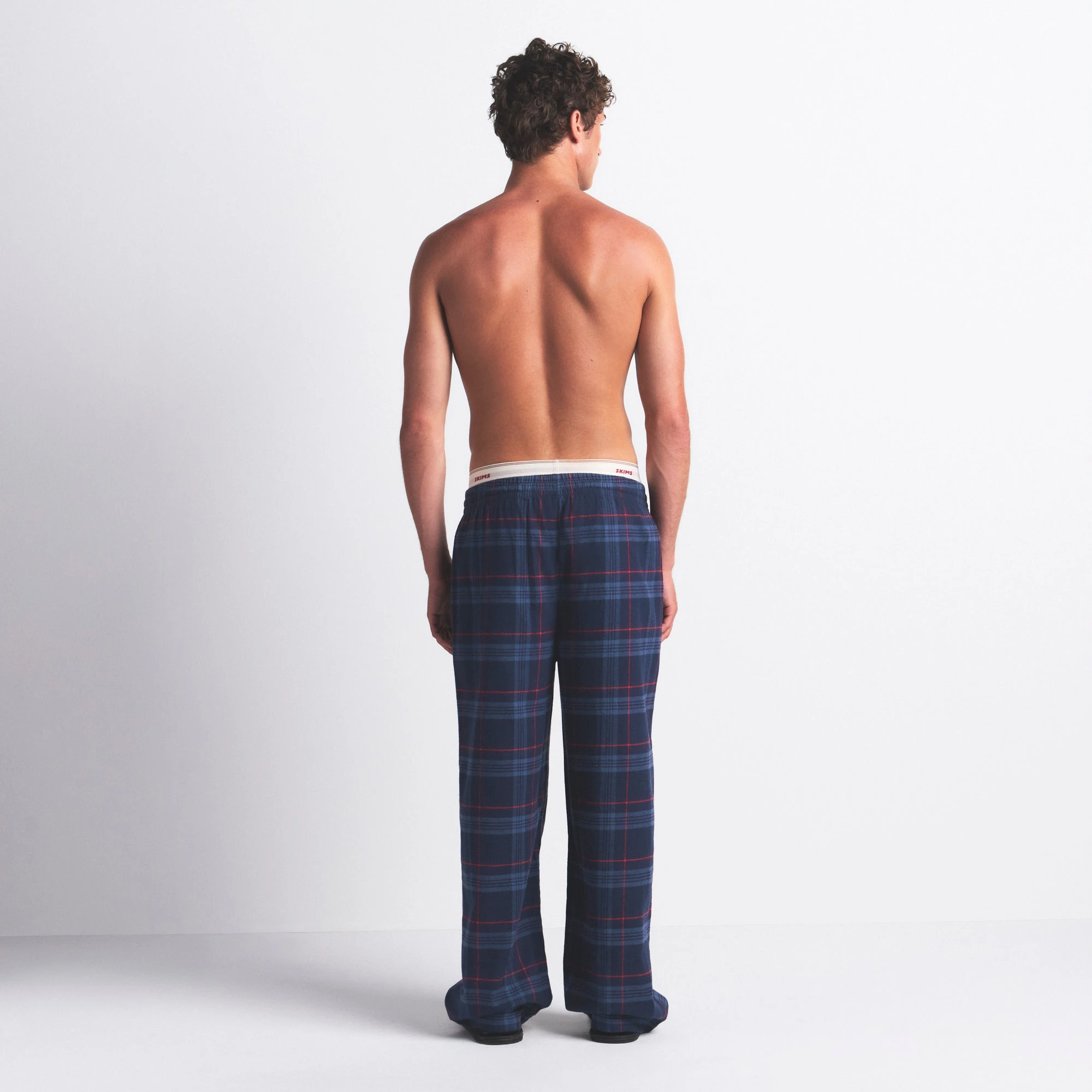 FLANNEL SLEEP MENS PANT | DAMSON LASER PLAID ON A MODEL SIDE VIEW @ | FOCUS: 0.0, 1.0, 0.9
