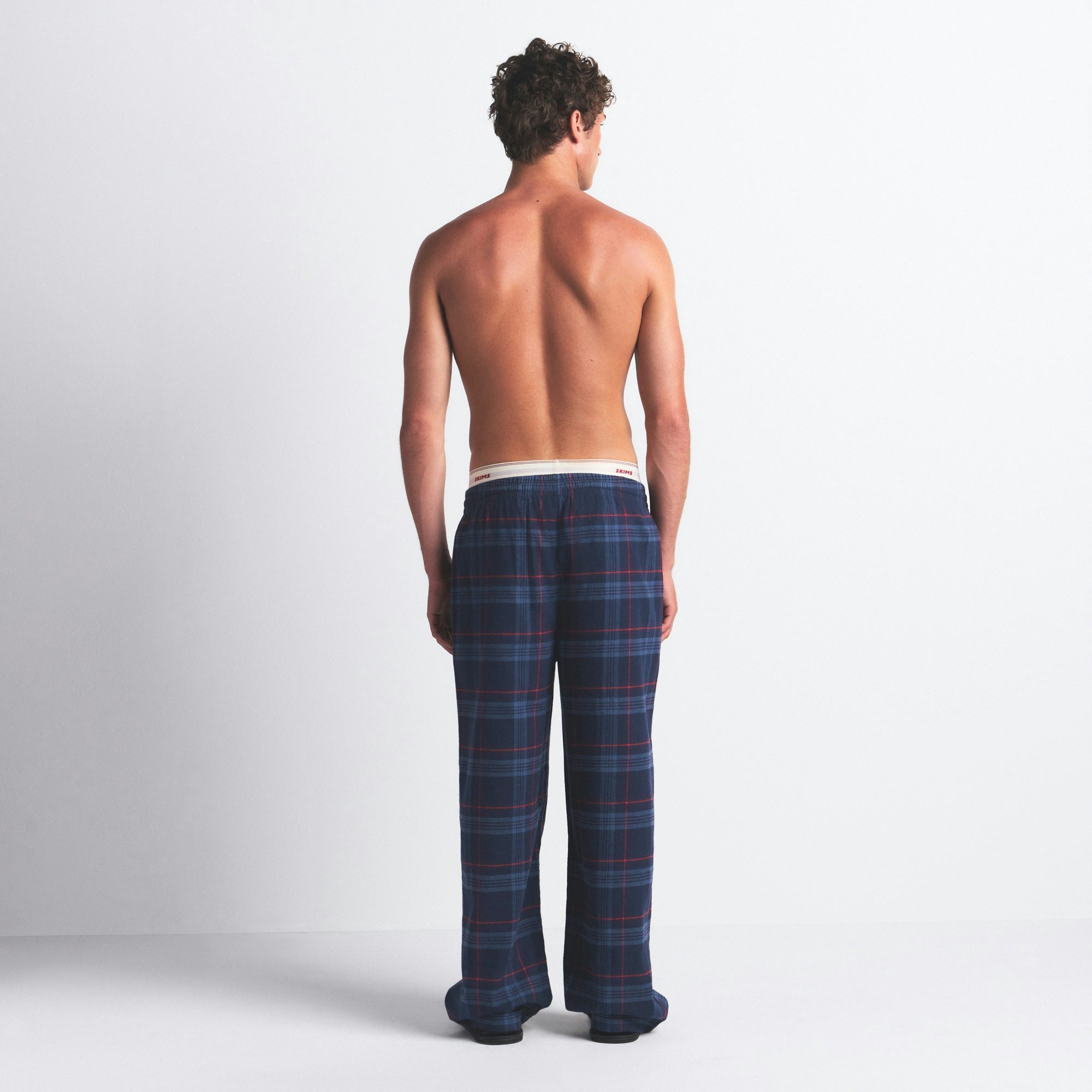FLANNEL SLEEP MENS PANT | DAMSON LASER PLAID ON A MODEL SIDE VIEW @ | FOCUS: 0.0, 1.0, 0.9