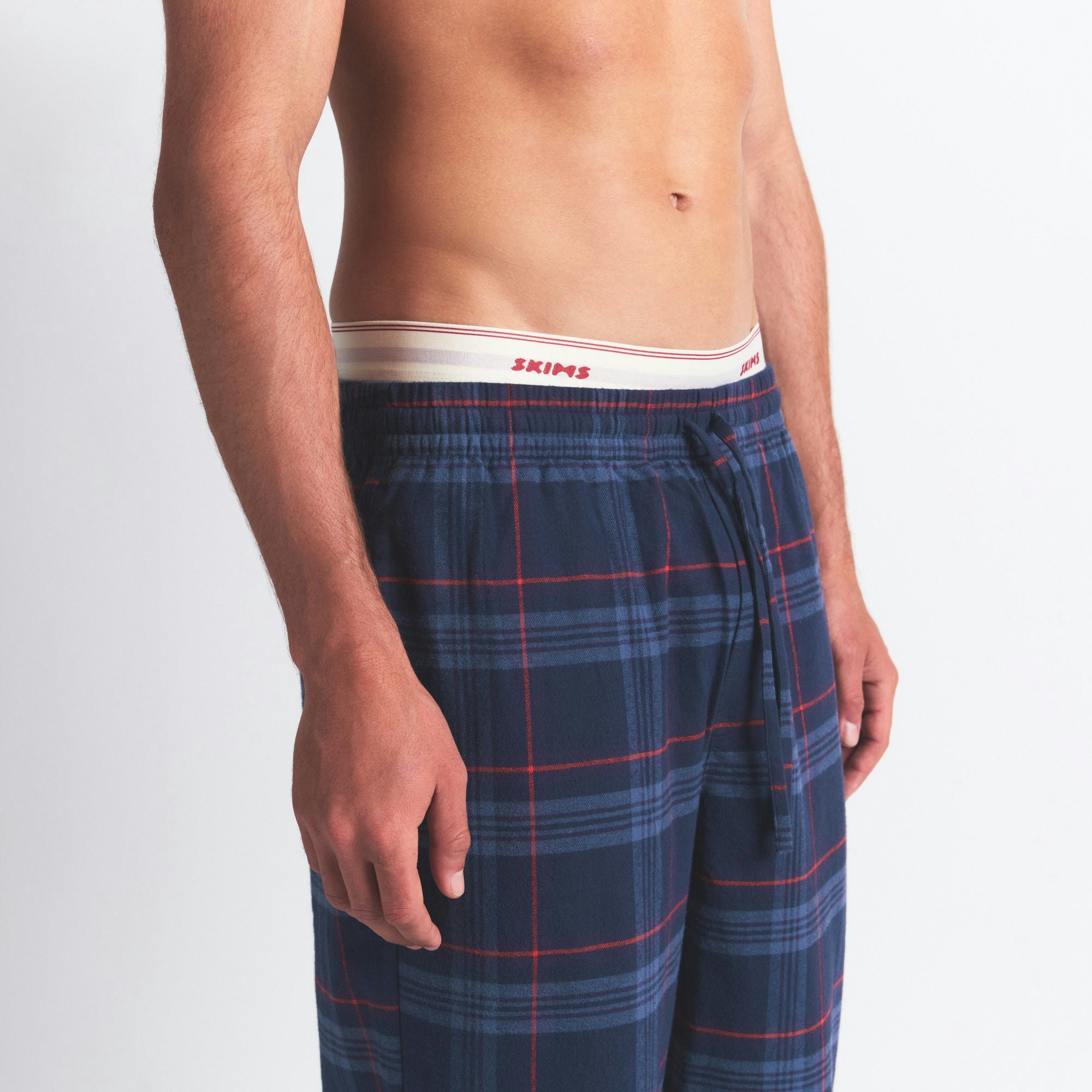 FLANNEL SLEEP MENS PANT | DAMSON LASER PLAID ON A MODEL SIDE VIEW @ | FOCUS: 0.0, 1.0, 0.9