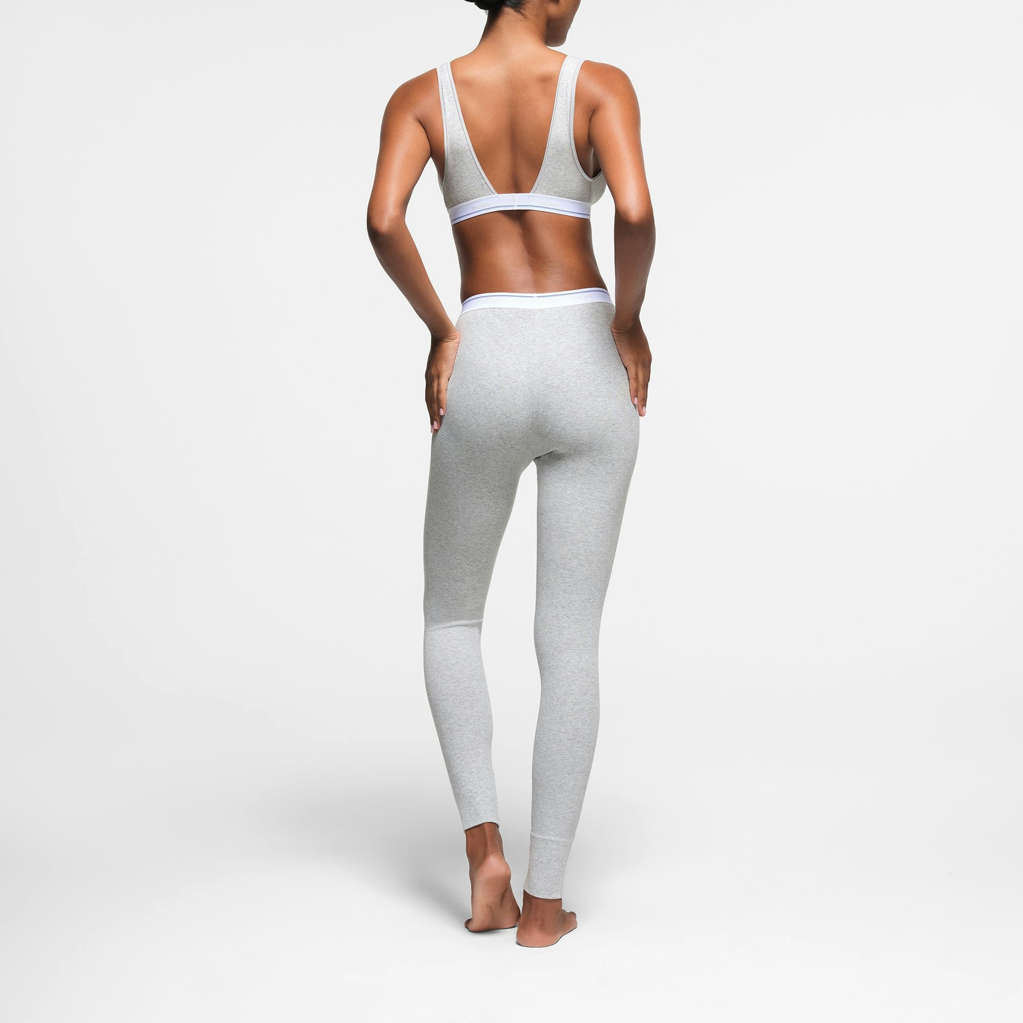 COTTON RIB LEGGING | LIGHT HEATHER GREY SPORT STRIPE ON A MODEL BACK VIEW