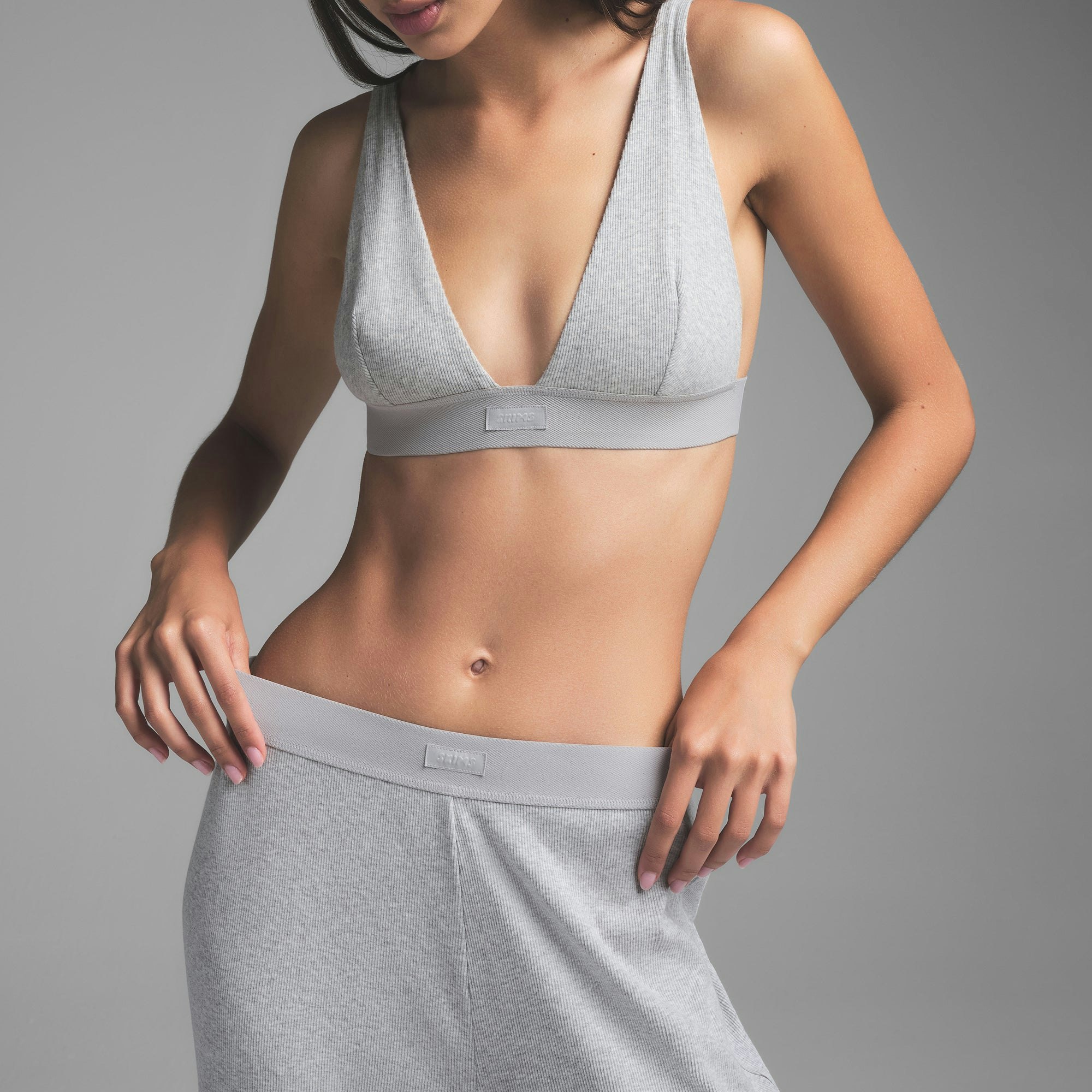 COTTON RIB PANT | LIGHT HEATHER GREY ON A MODEL SIDE VIEW