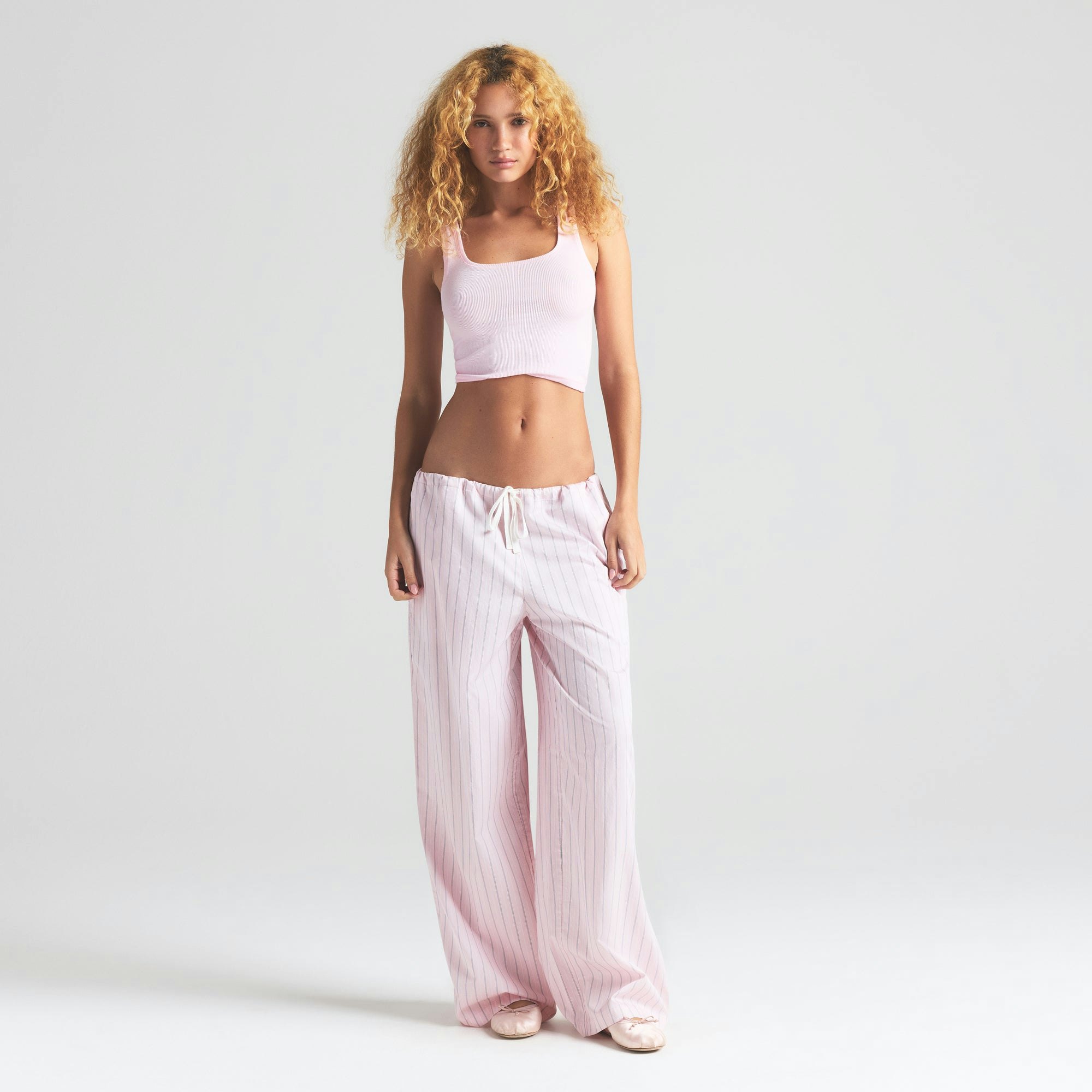 COTTON POPLIN STRAIGHT LEG PANT | PALE PINK AB PENCIL STRIPE ON A MODEL FRONT VIEW | FOCUS: 0.0, 1.0, 0.9