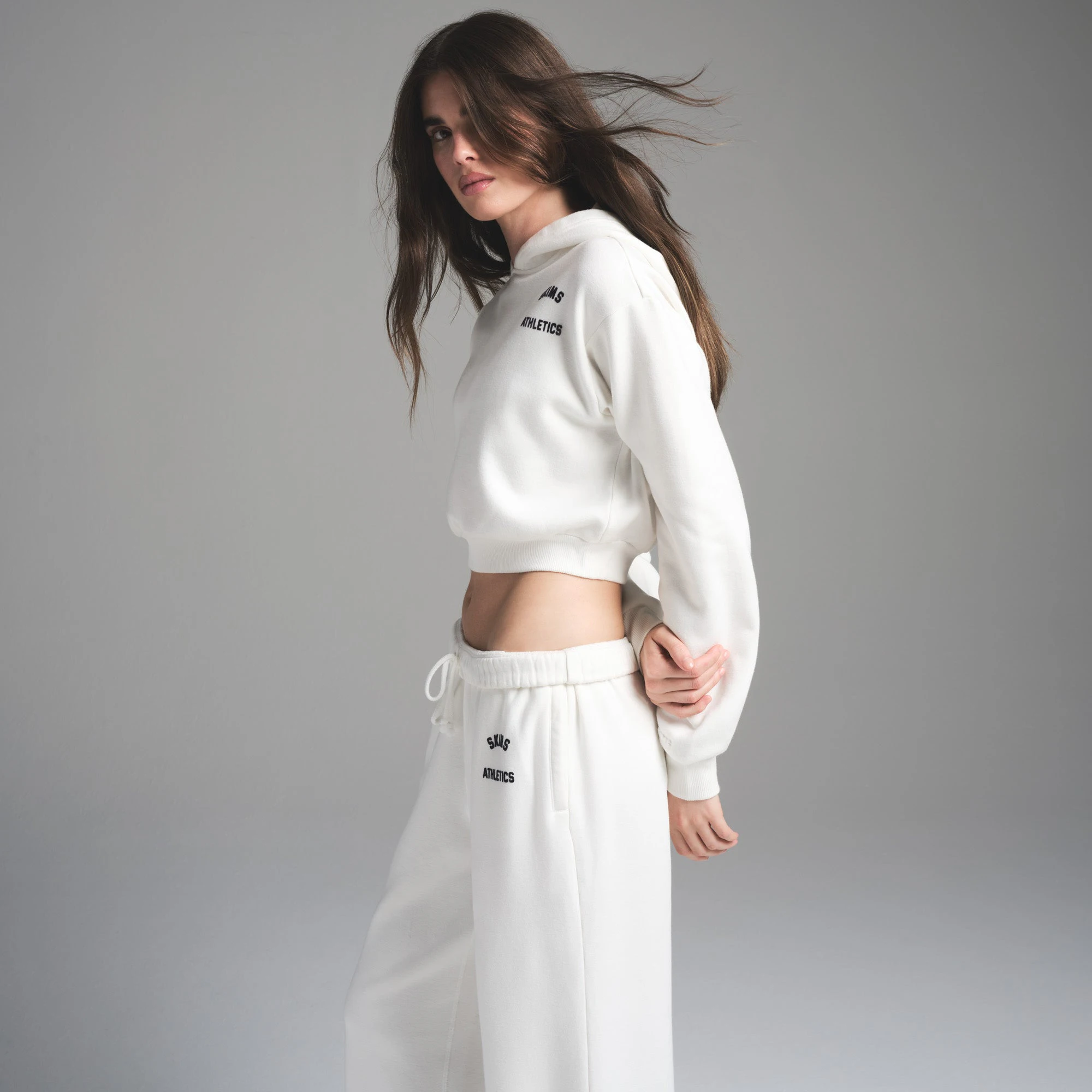 COTTON FLEECE CLASSIC STRAIGHT LEG PANT | MARBLE WITH GRAPHIC ON A MODEL FRONT VIEW | FOCUS: 0.0, 1.0, 0.9