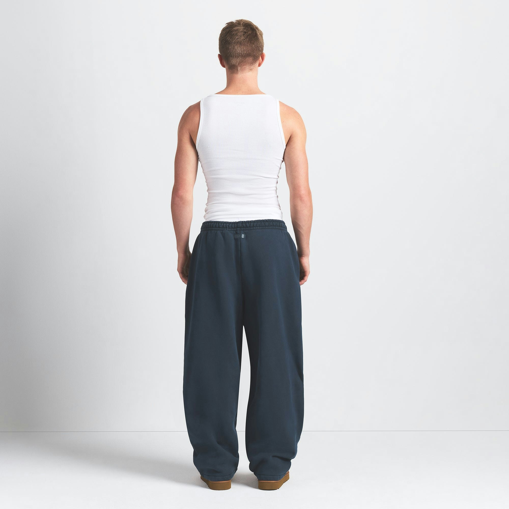 HEAVYWEIGHT FLEECE MENS STRAIGHT LEG PANT | NAVY ON A MODEL BACK VIEW @ | FOCUS: 0.0, 1.0, 0.9