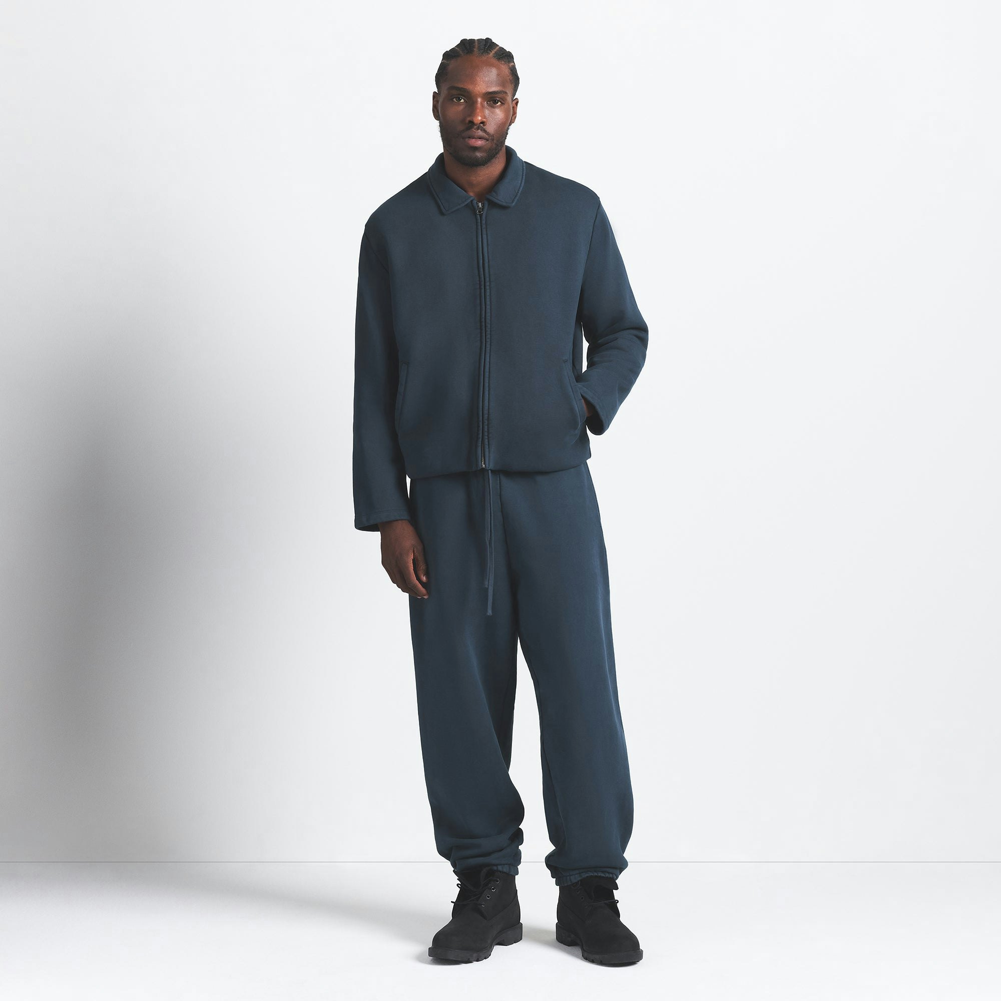 HEAVYWEIGHT FLEECE MENS JOGGER | NAVY ON A MODEL FRONT VIEW @ | FOCUS: 0.0, 1.0, 0.9