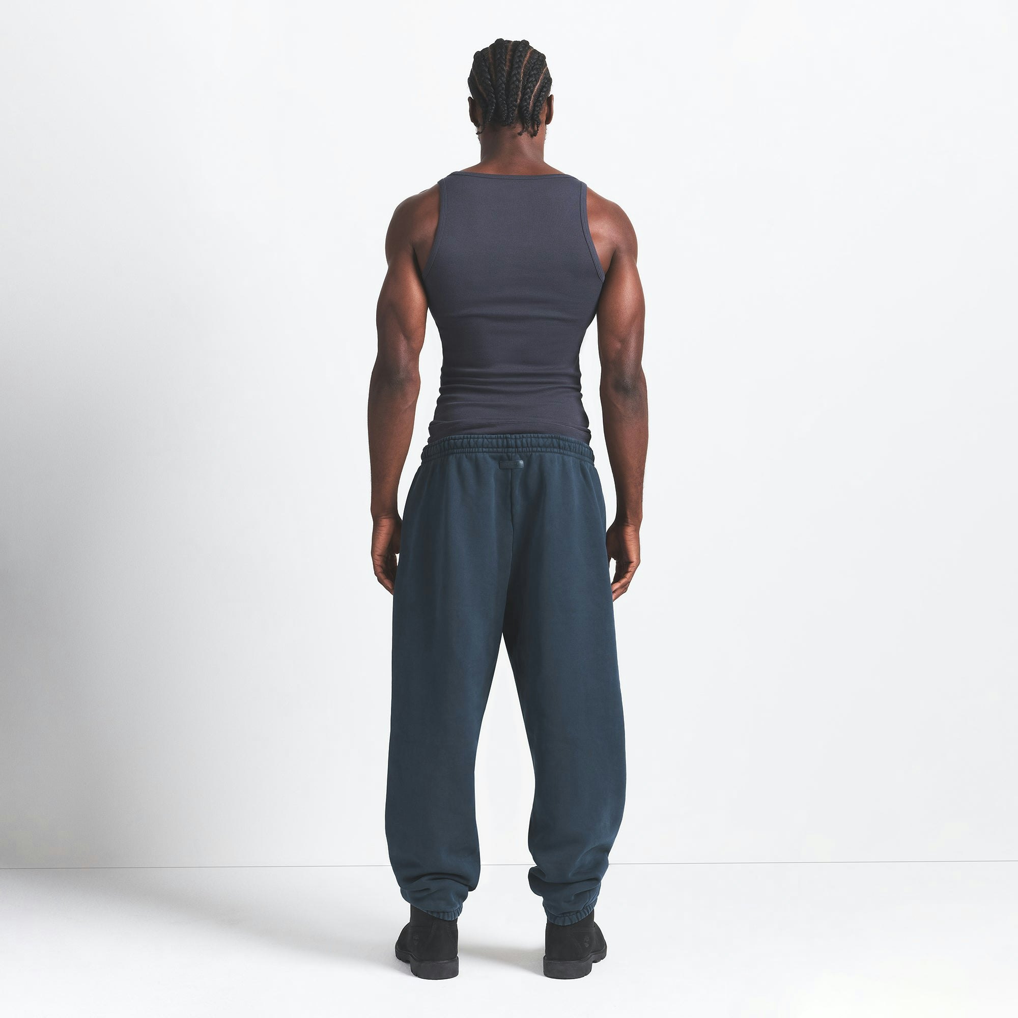 HEAVYWEIGHT FLEECE MENS JOGGER | NAVY ON A MODEL BACK VIEW @ | FOCUS: 0.0, 1.0, 0.9