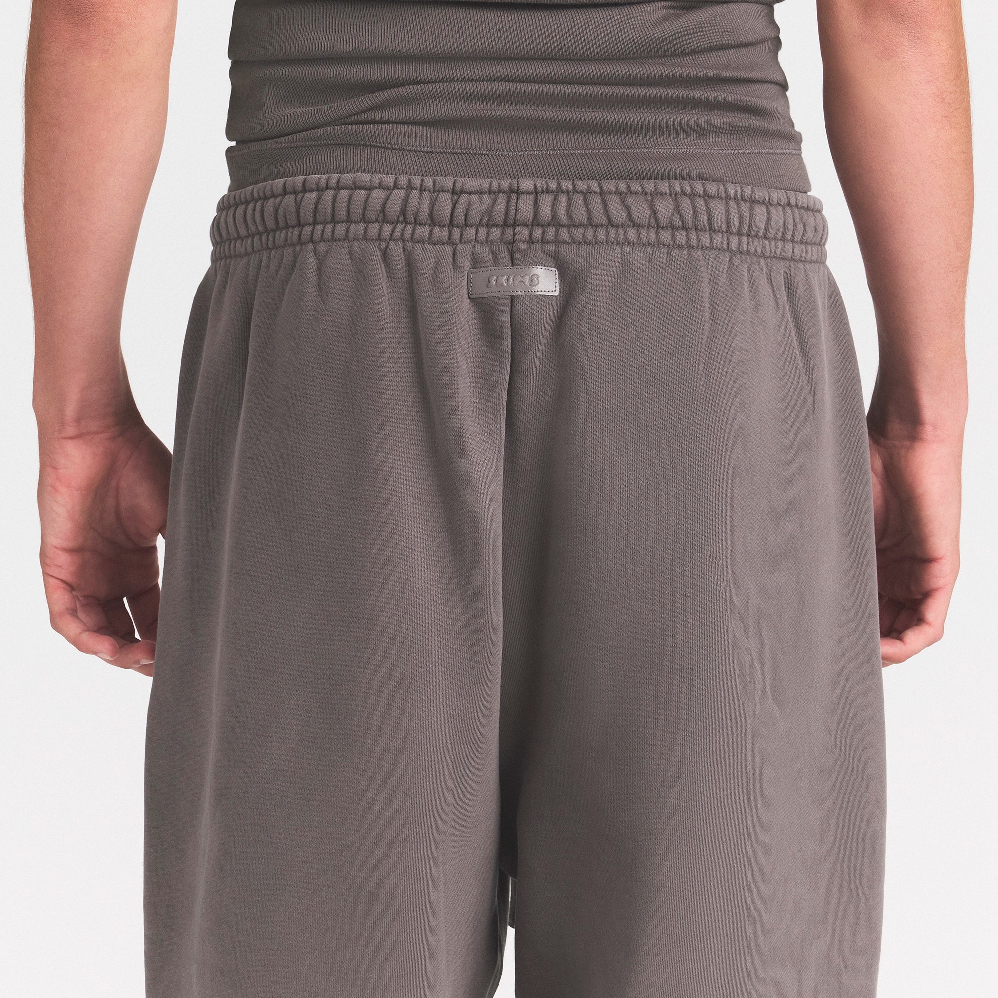 HEAVYWEIGHT FLEECE MENS JOGGER | STERLING ON A MODEL SIDE VIEW @ | FOCUS: 0.0, 1.0, 0.9