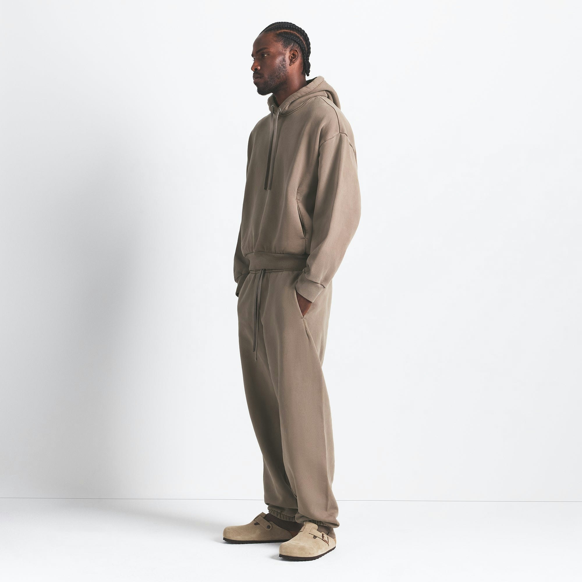 HEAVYWEIGHT FLEECE MENS JOGGER | TRUFFLE ON A MODEL SIDE VIEW @ | FOCUS: 0.0, 1.0, 0.9