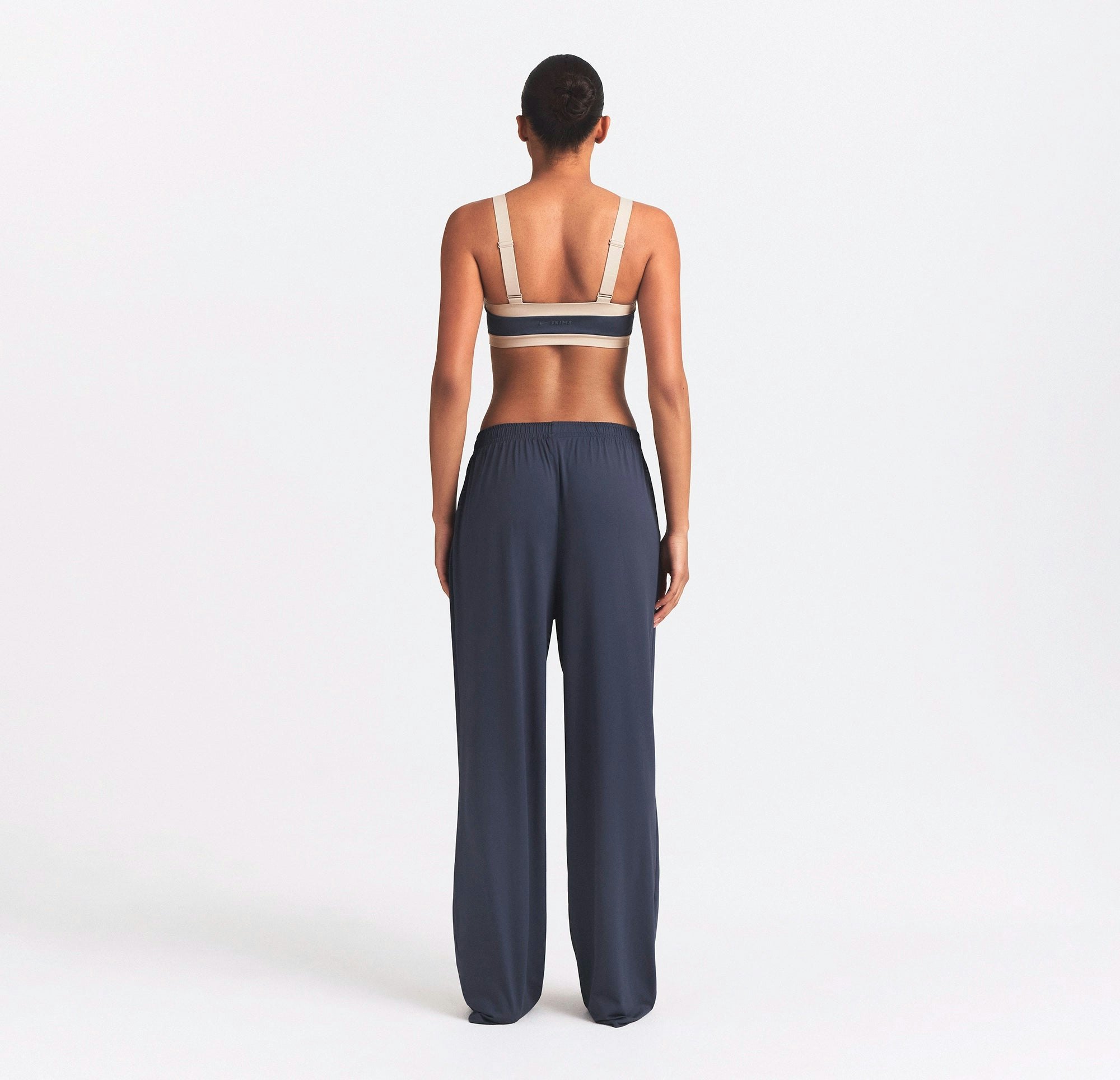NikeSKIMS AIRY WIDE LEG PANT | DEEP ROYAL ON A MODEL SIDE VIEW @ | FOCUS: 0.0, 1.0, 0.9