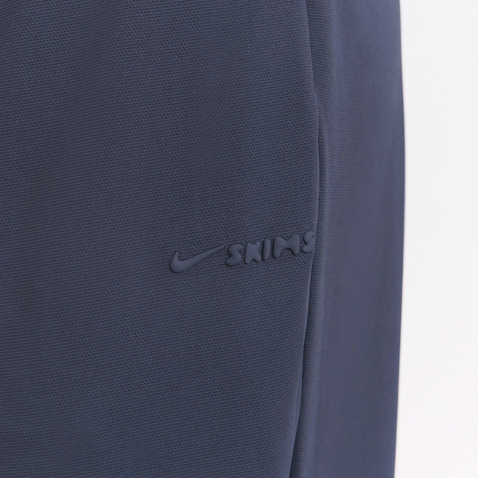 NikeSKIMS AIRY WIDE LEG PANT | DEEP ROYAL ON A MODEL SIDE VIEW @ | FOCUS: 0.0, 1.0, 0.9