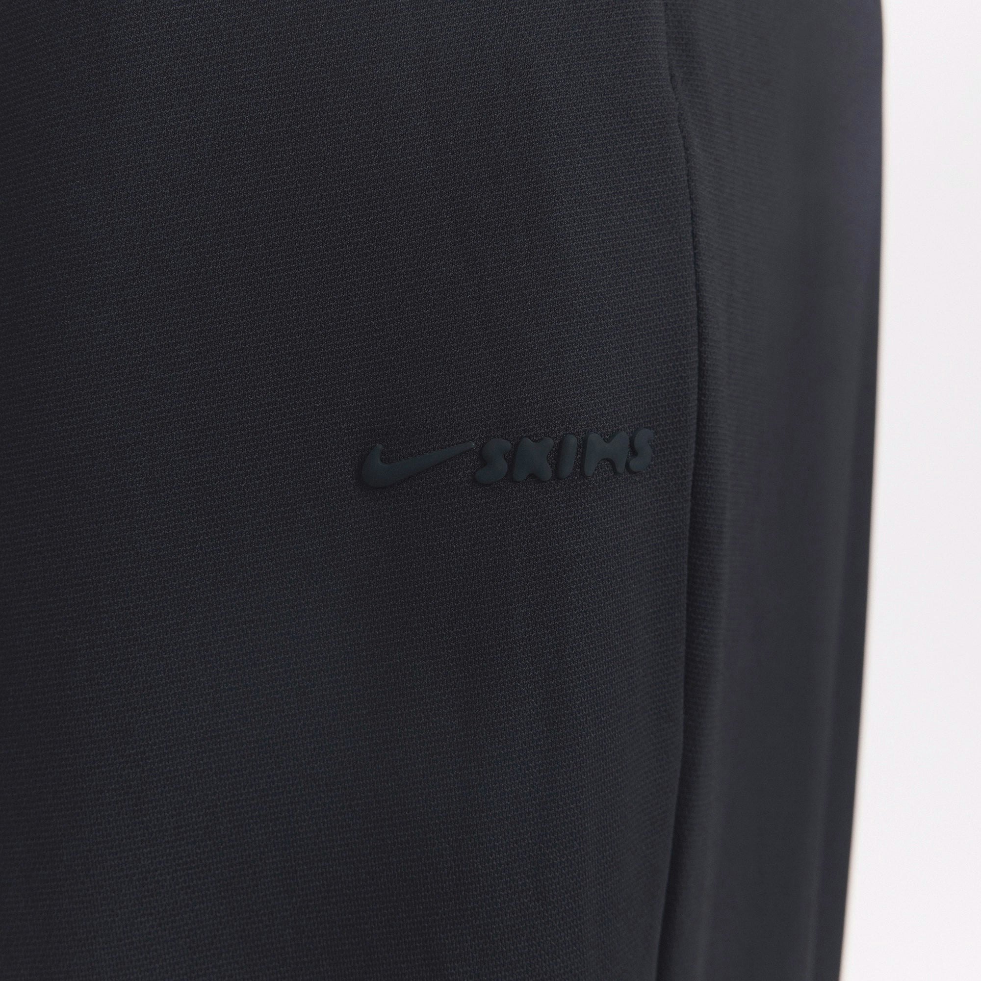 NikeSKIMS AIRY WIDE LEG PANT | OBSIDIAN ON A MODEL SIDE VIEW @ | FOCUS: 0.0, 1.0, 0.9