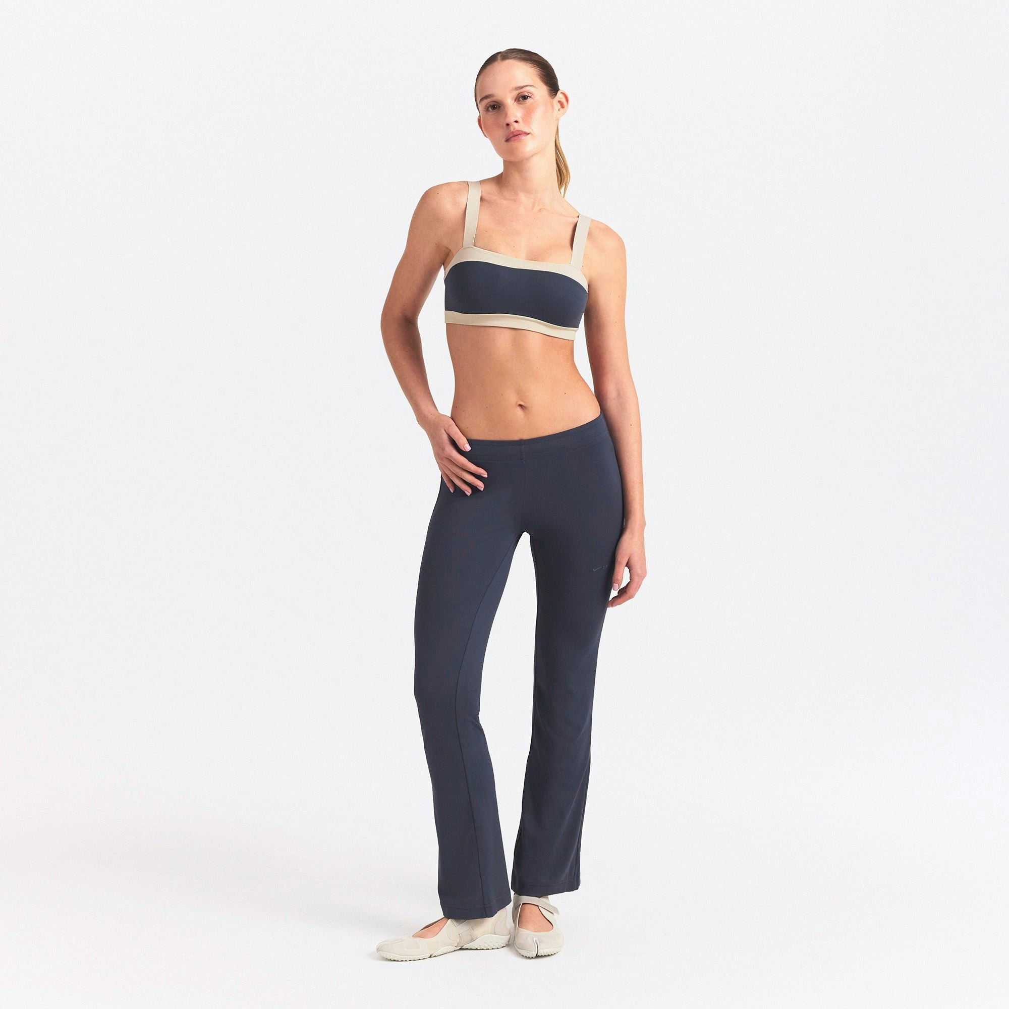 NikeSKIMS AIRY STRAIGHT LEG PANT | DEEP ROYAL ON A MODEL FRONT VIEW @ | FOCUS: 0.0, 1.0, 0.9