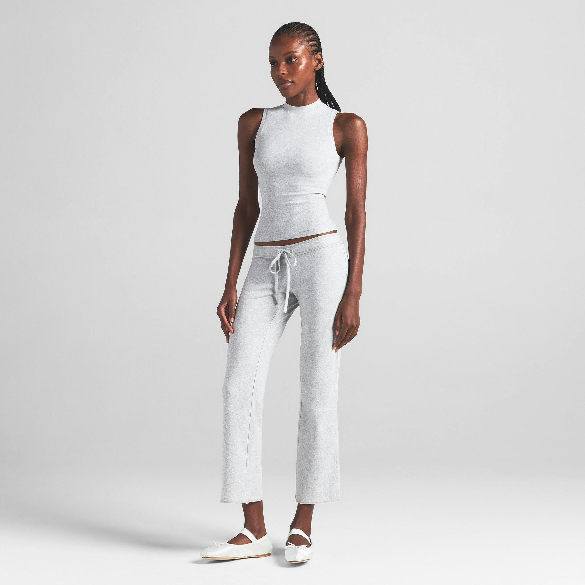 COTTON JERSEY LOW RISE CROP PANT | LIGHT HEATHER GREY ON A MODEL FRONT VIEW | FOCUS: 0.0, 1.0, 0.9