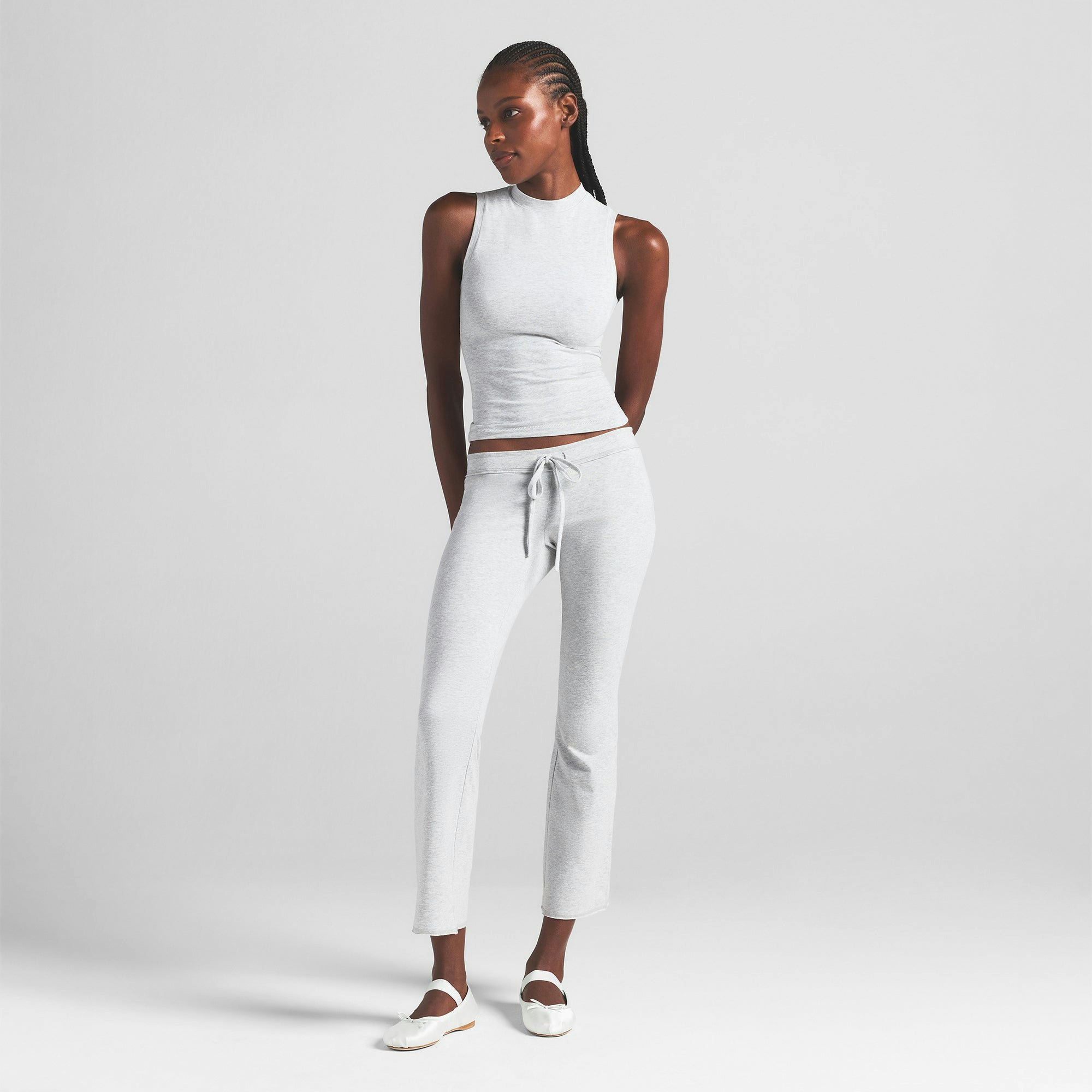 COTTON JERSEY LOW RISE CROP PANT | LIGHT HEATHER GREY ON A MODEL FRONT VIEW | FOCUS: 0.0, 1.0, 0.9