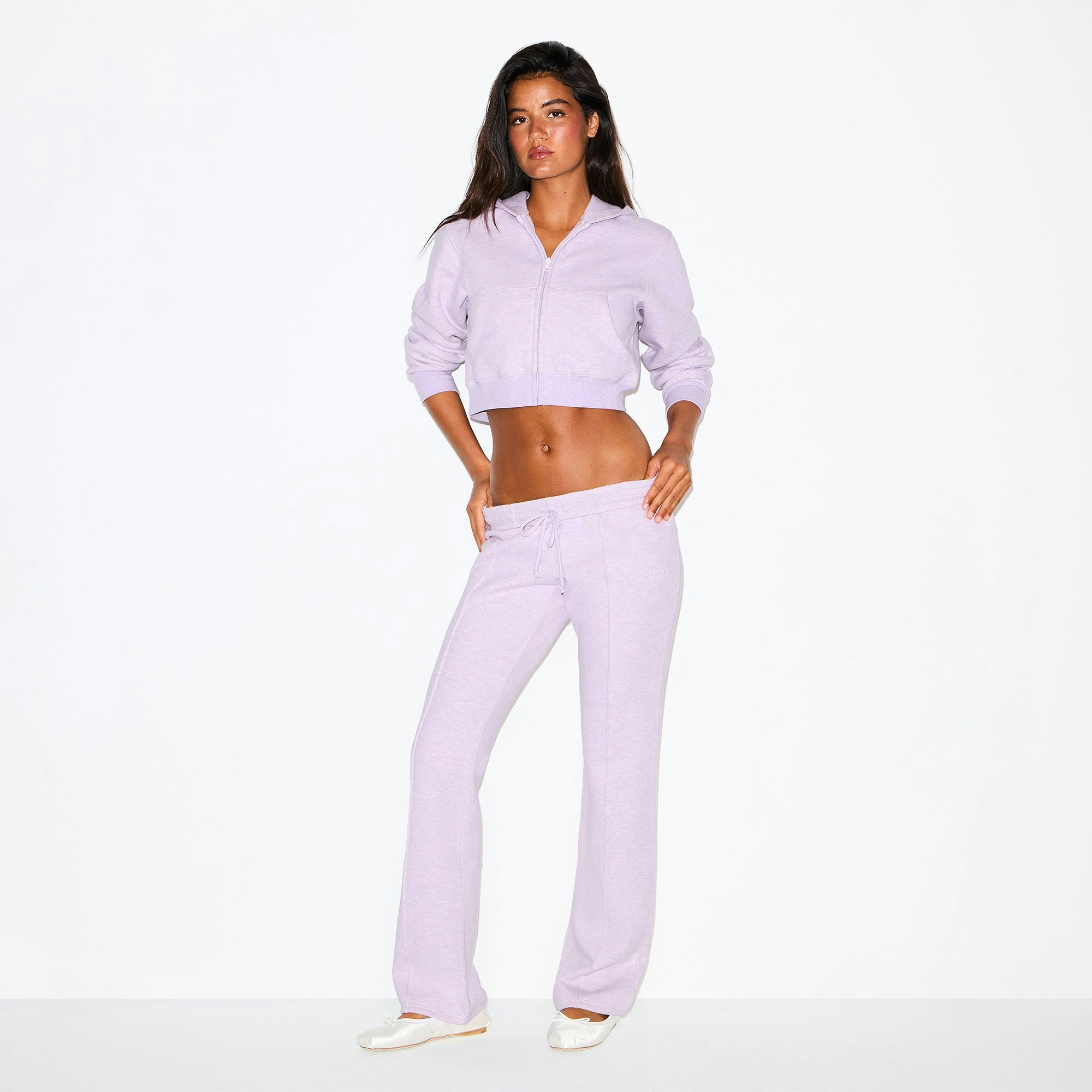 COTTON FLEECE LOW RISE SLIM PANT | PURPLE HEATHER ON A MODEL FRONT VIEW @ | FOCUS: 0.0, 1.0, 0.9