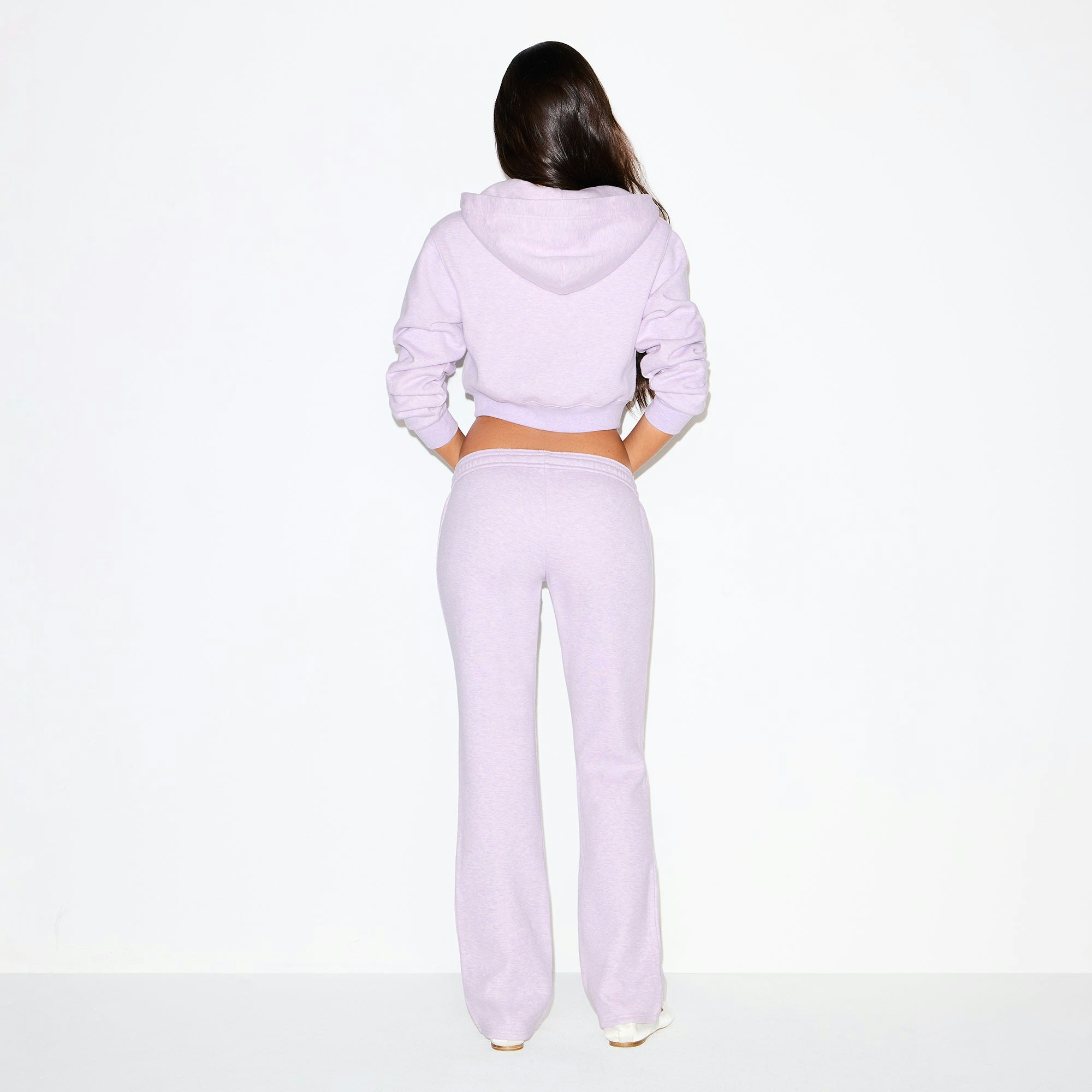 COTTON FLEECE LOW RISE SLIM PANT | PURPLE HEATHER ON A MODEL BACK VIEW @ | FOCUS: 0.0, 1.0, 0.9