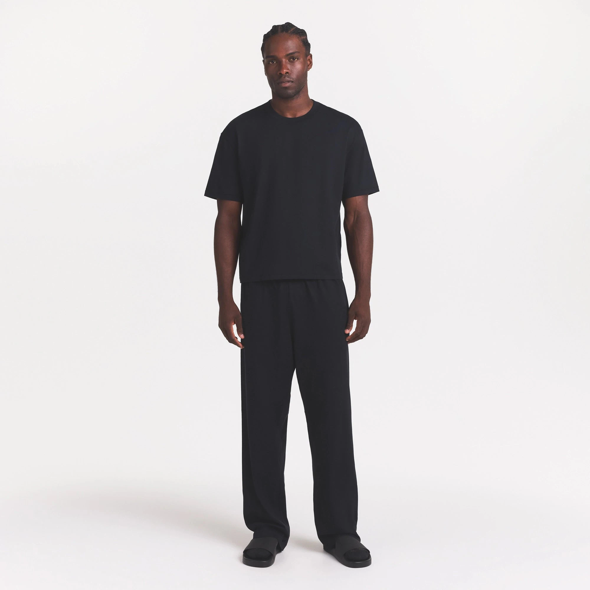 HEAVYWEIGHT COTTON MENS RELAXED PANT | OBSIDIAN ON A MODEL FRONT VIEW