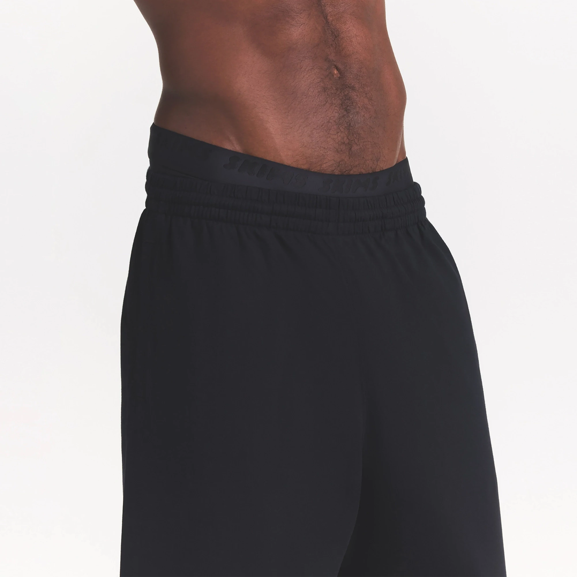 HEAVYWEIGHT COTTON MENS RELAXED PANT | OBSIDIAN ON A MODEL SIDE VIEW