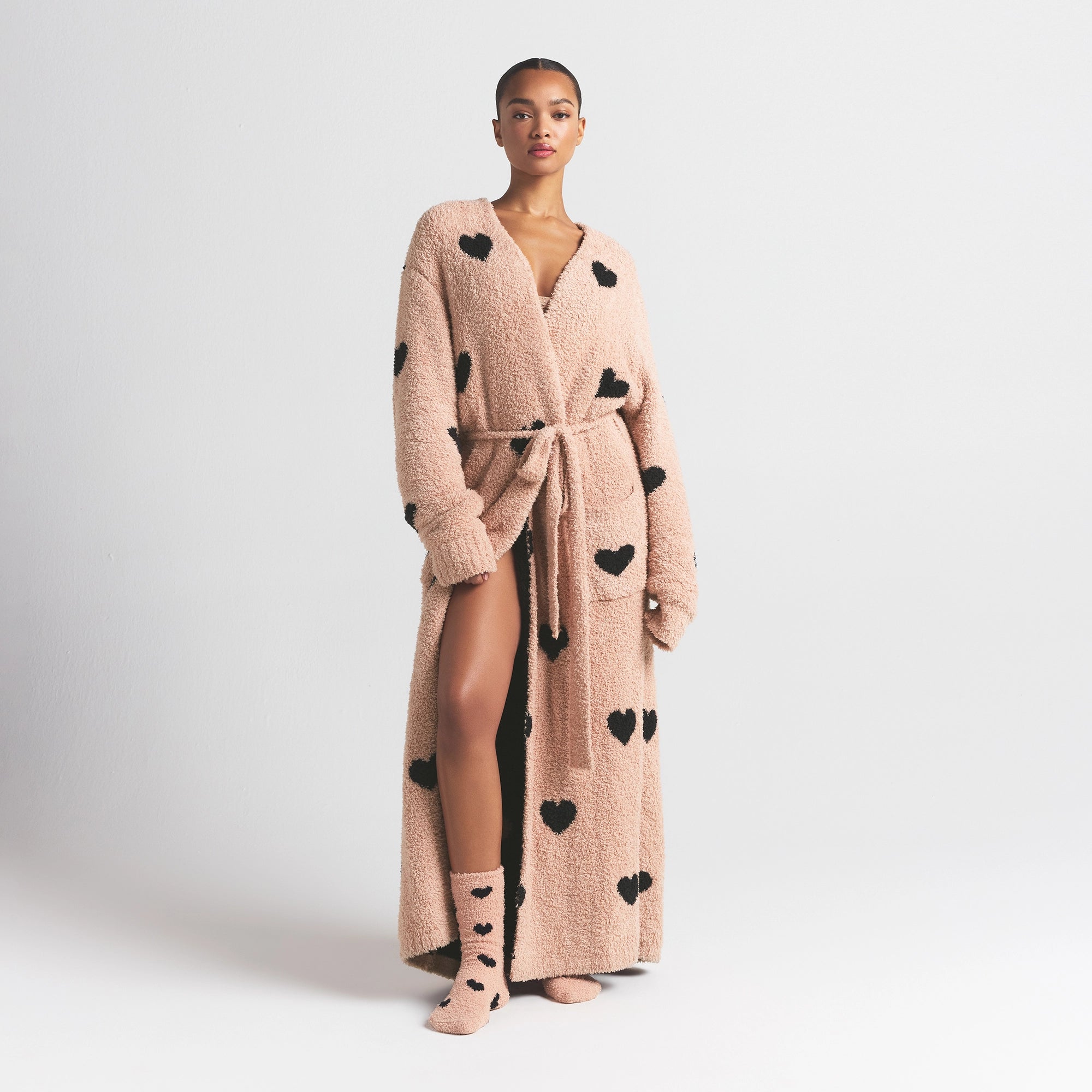 COZY KNIT UNISEX ROBE | MICA SPACED HEARTS ON A MODEL FRONT VIEW @ | FOCUS: 0.0, 1.0, 0.9
