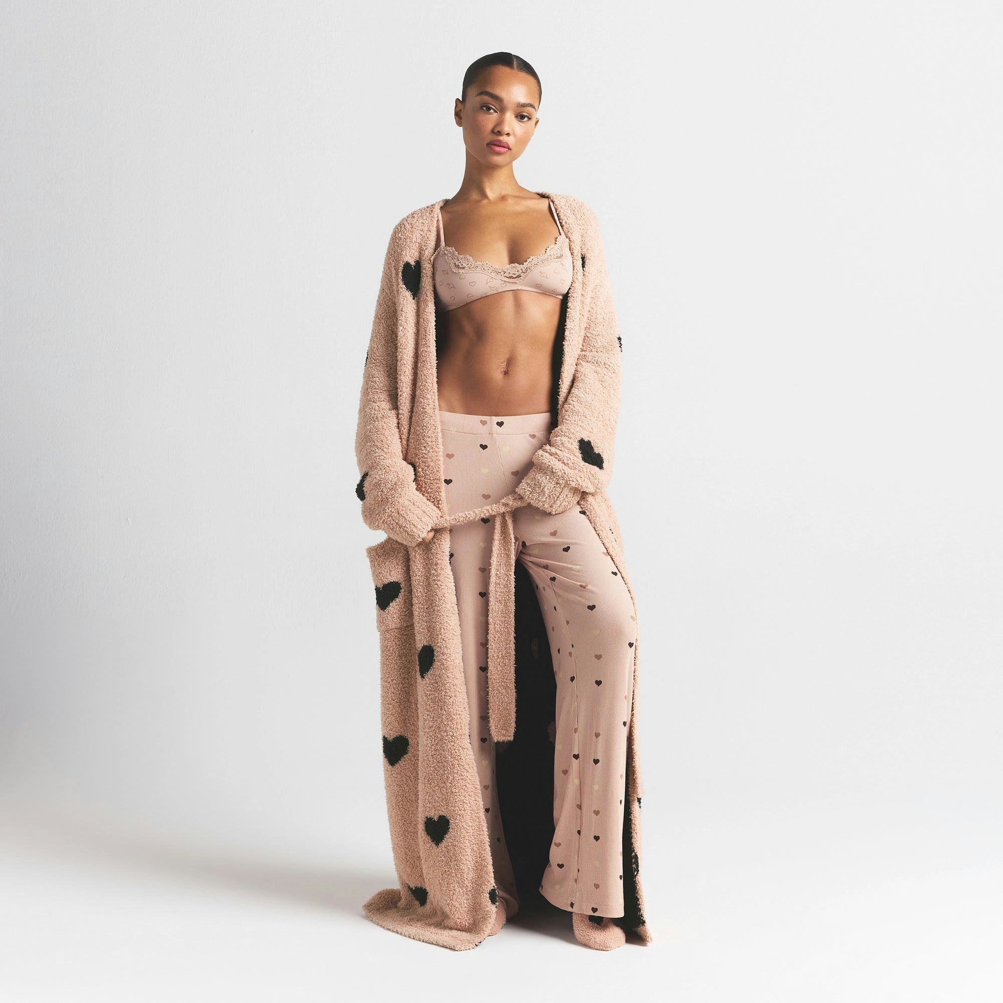 COZY KNIT UNISEX ROBE | MICA SPACED HEARTS ON A MODEL FRONT VIEW @ | FOCUS: 0.0, 1.0, 0.9