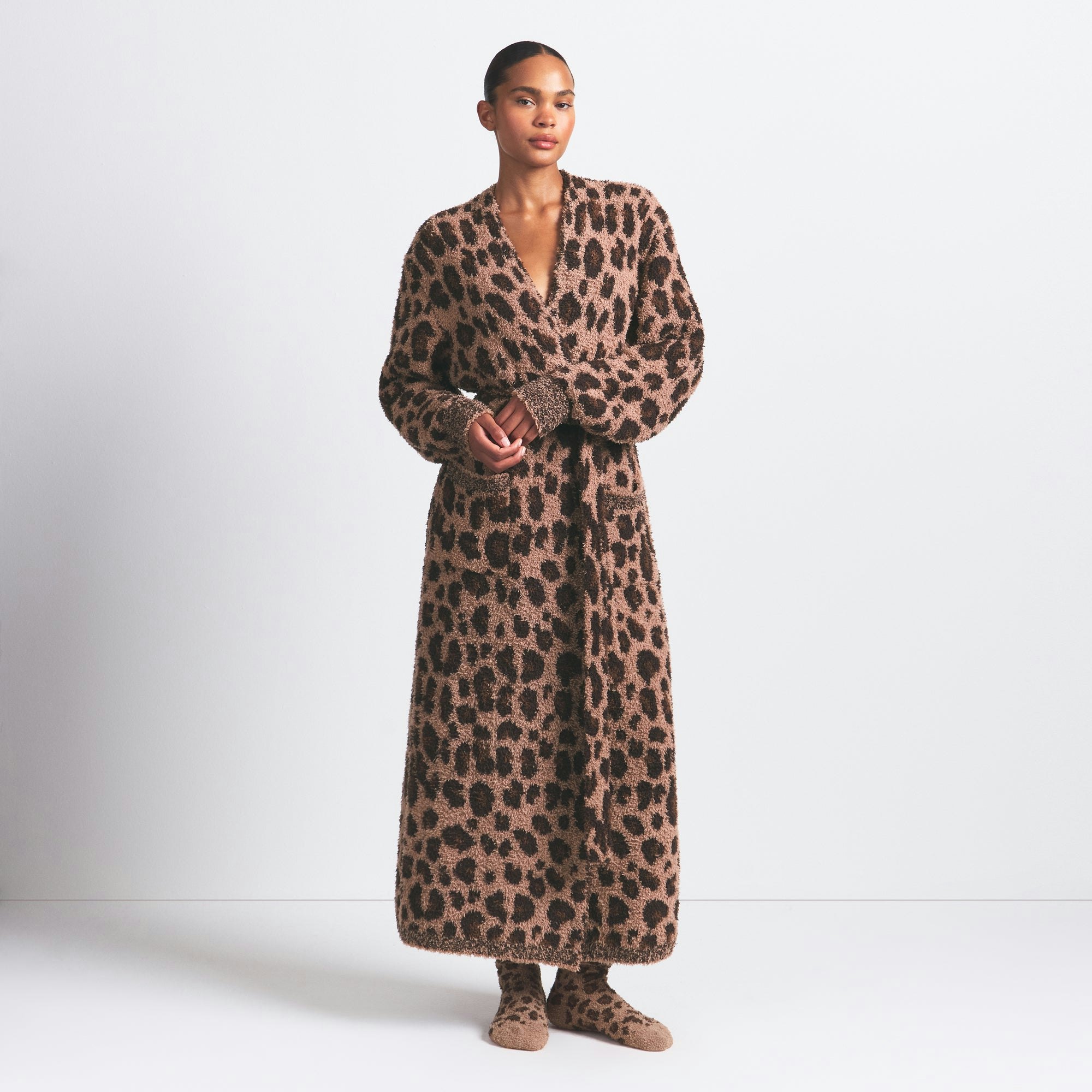 COZY KNIT SOCK | SIENNA LEOPARD PRINT ON A MODEL FRONT VIEW @ | FOCUS: 0.0, 1.0, 0.9