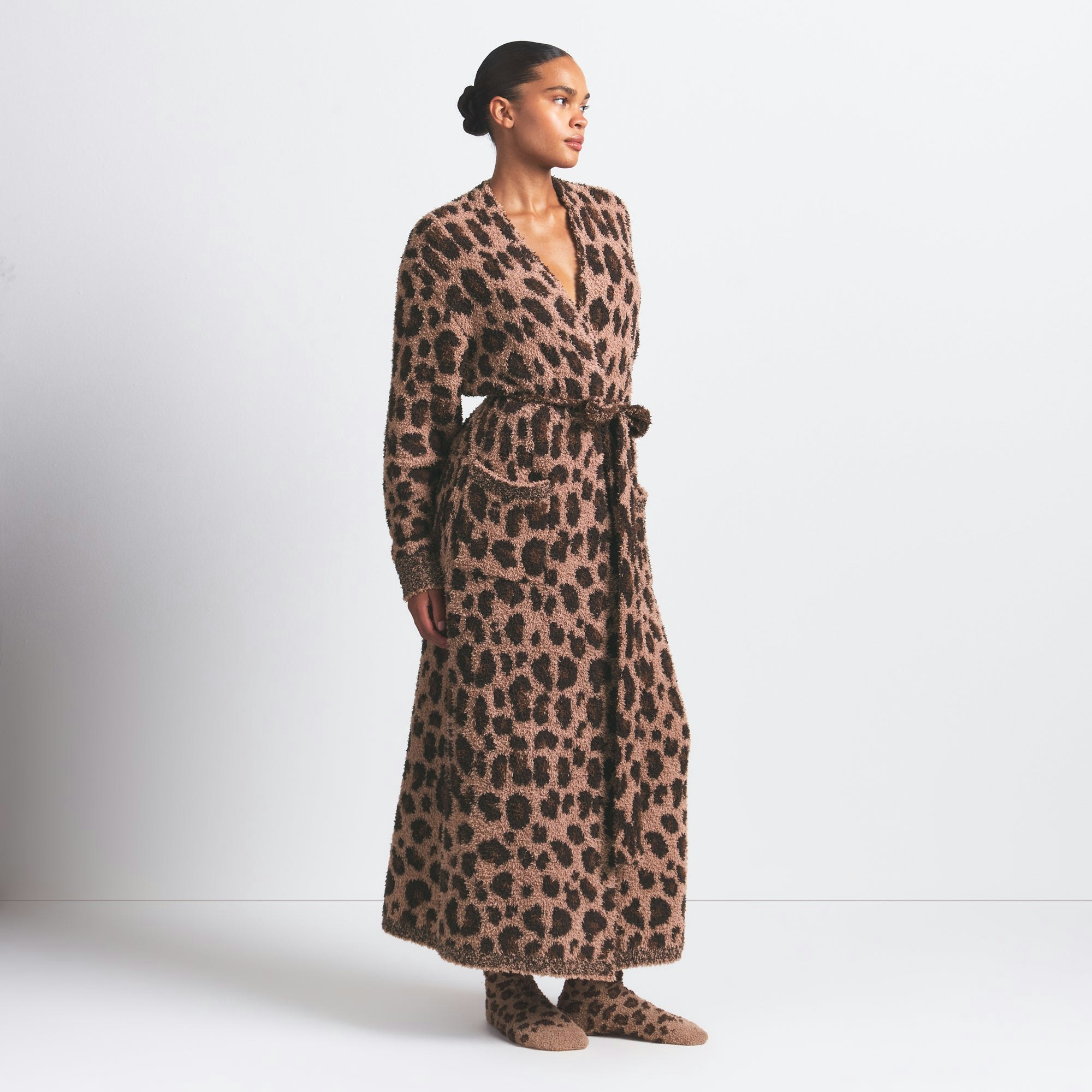 COZY KNIT SOCK | SIENNA LEOPARD PRINT ON A MODEL FRONT VIEW @ | FOCUS: 0.0, 1.0, 0.9