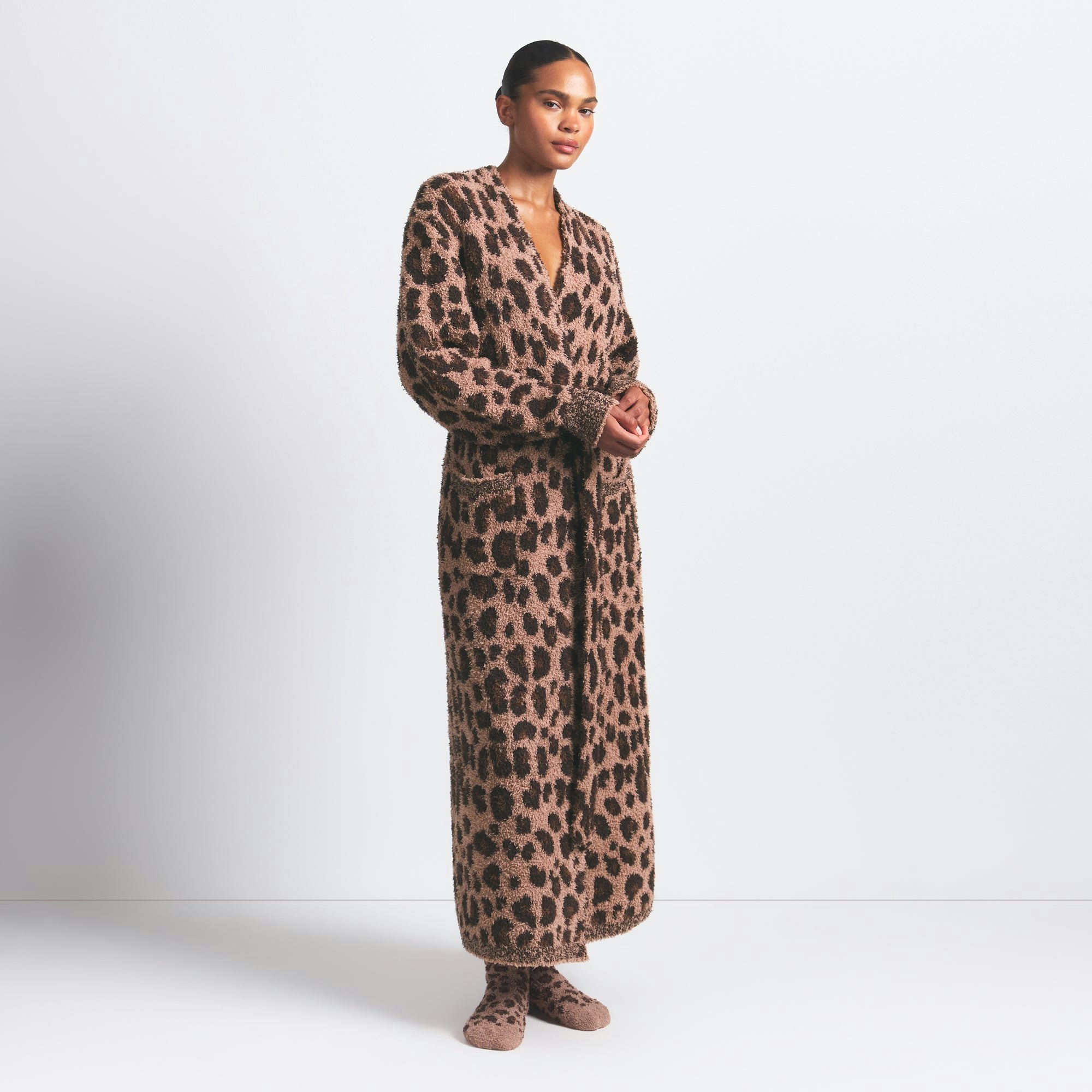 COZY KNIT UNISEX ROBE | SIENNA LEOPARD PRINT ON A MODEL FRONT VIEW @ | FOCUS: 0.0, 1.0, 0.9