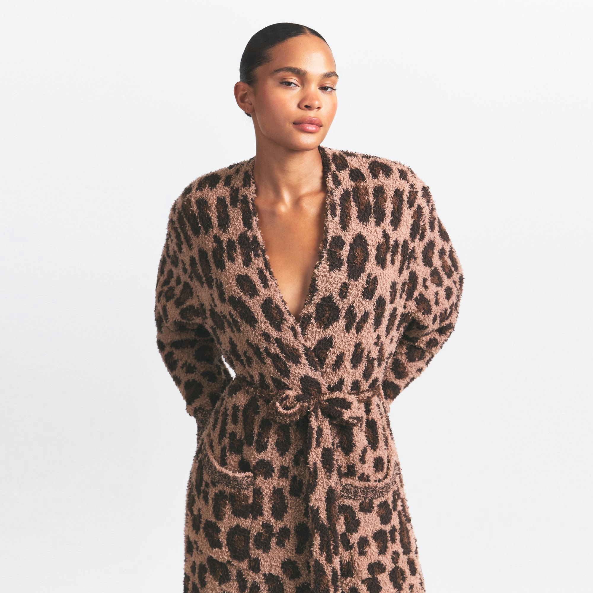 COZY KNIT UNISEX ROBE | SIENNA LEOPARD PRINT ON A MODEL SIDE VIEW @ | FOCUS: 0.0, 1.0, 0.9