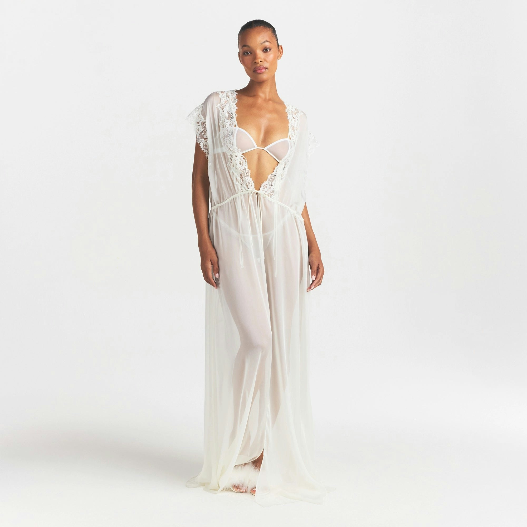 SKIMS ROMANCE LONG ROBE | IVORY ON A MODEL FRONT VIEW @ | FOCUS: 0.0, 1.0, 0.9