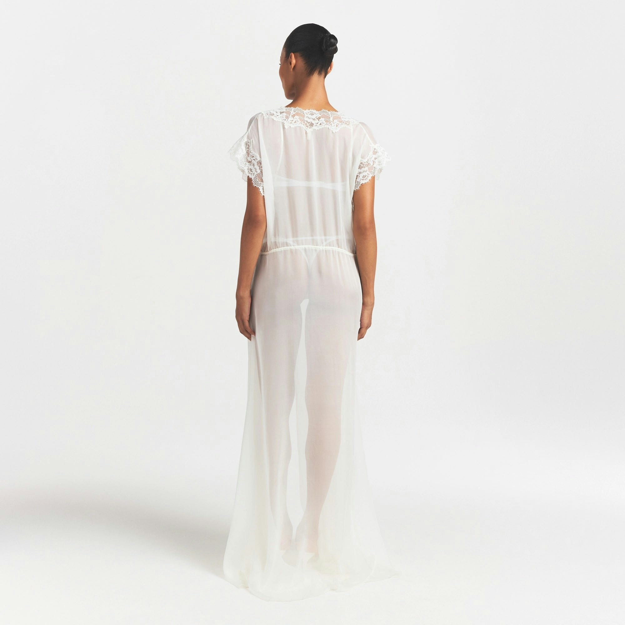 SKIMS ROMANCE LONG ROBE | IVORY ON A MODEL FRONT VIEW @ | FOCUS: 0.0, 1.0, 0.9