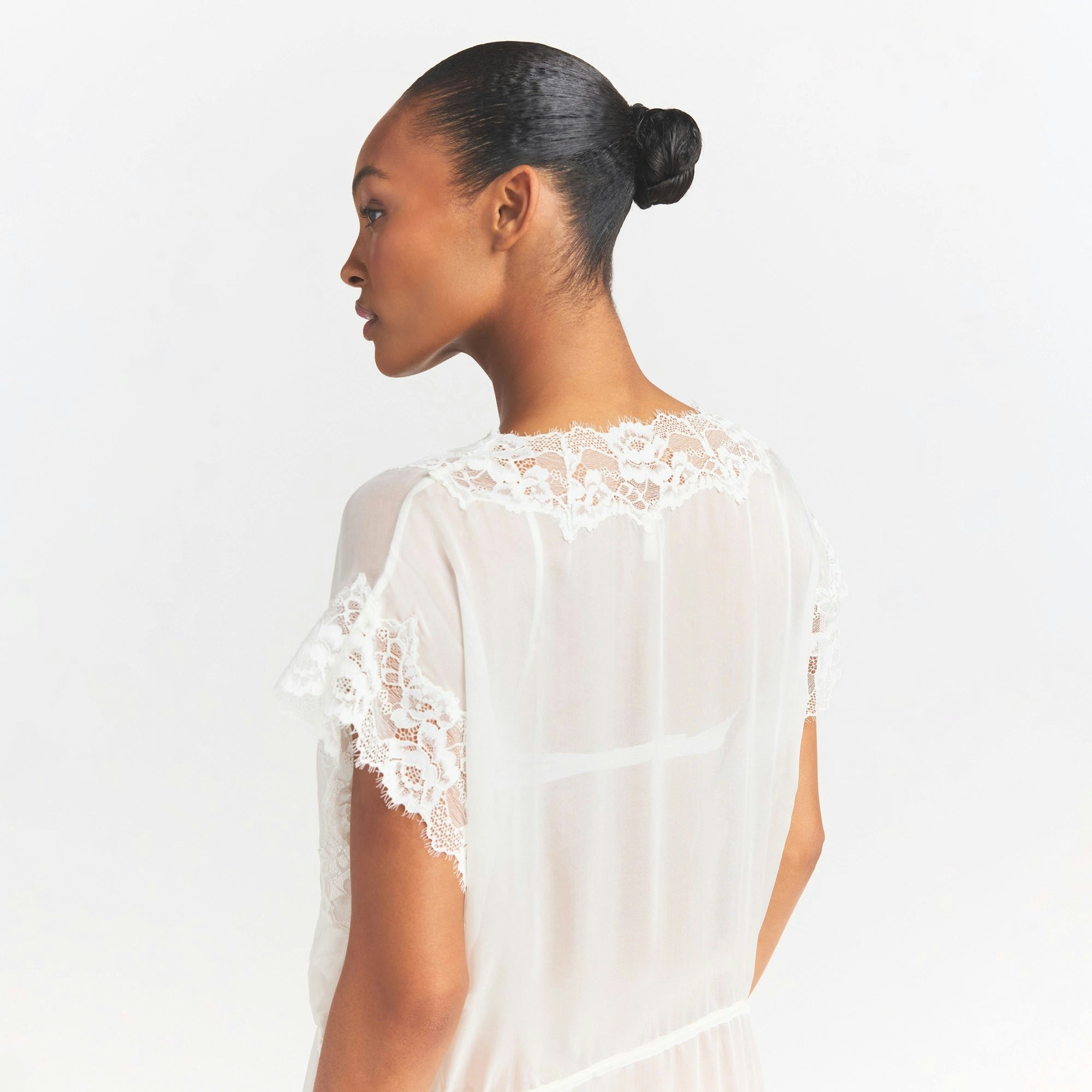 SKIMS ROMANCE LONG ROBE | IVORY ON A MODEL SIDE VIEW @ | FOCUS: 0.0, 1.0, 0.9