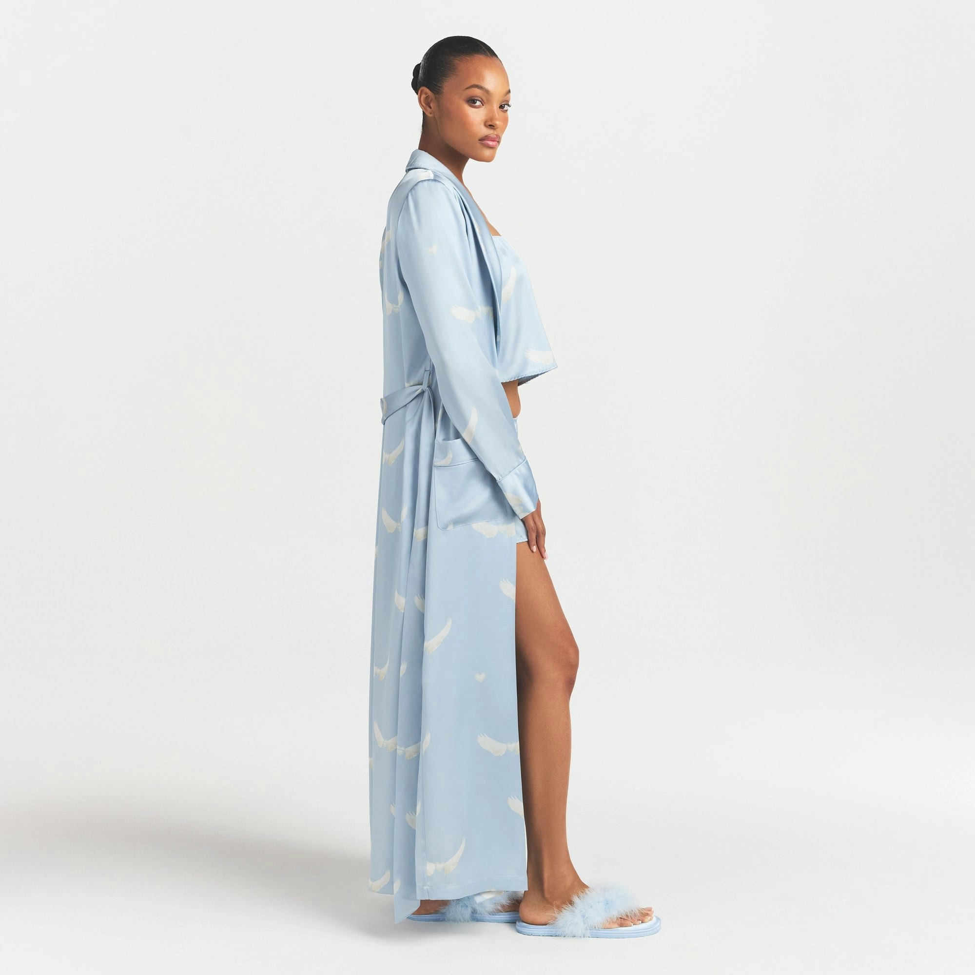 WOVEN SHINE LONG ROBE | AERO WING HEARTS PRINT ON A MODEL FRONT VIEW @ | FOCUS: 0.0, 1.0, 0.9