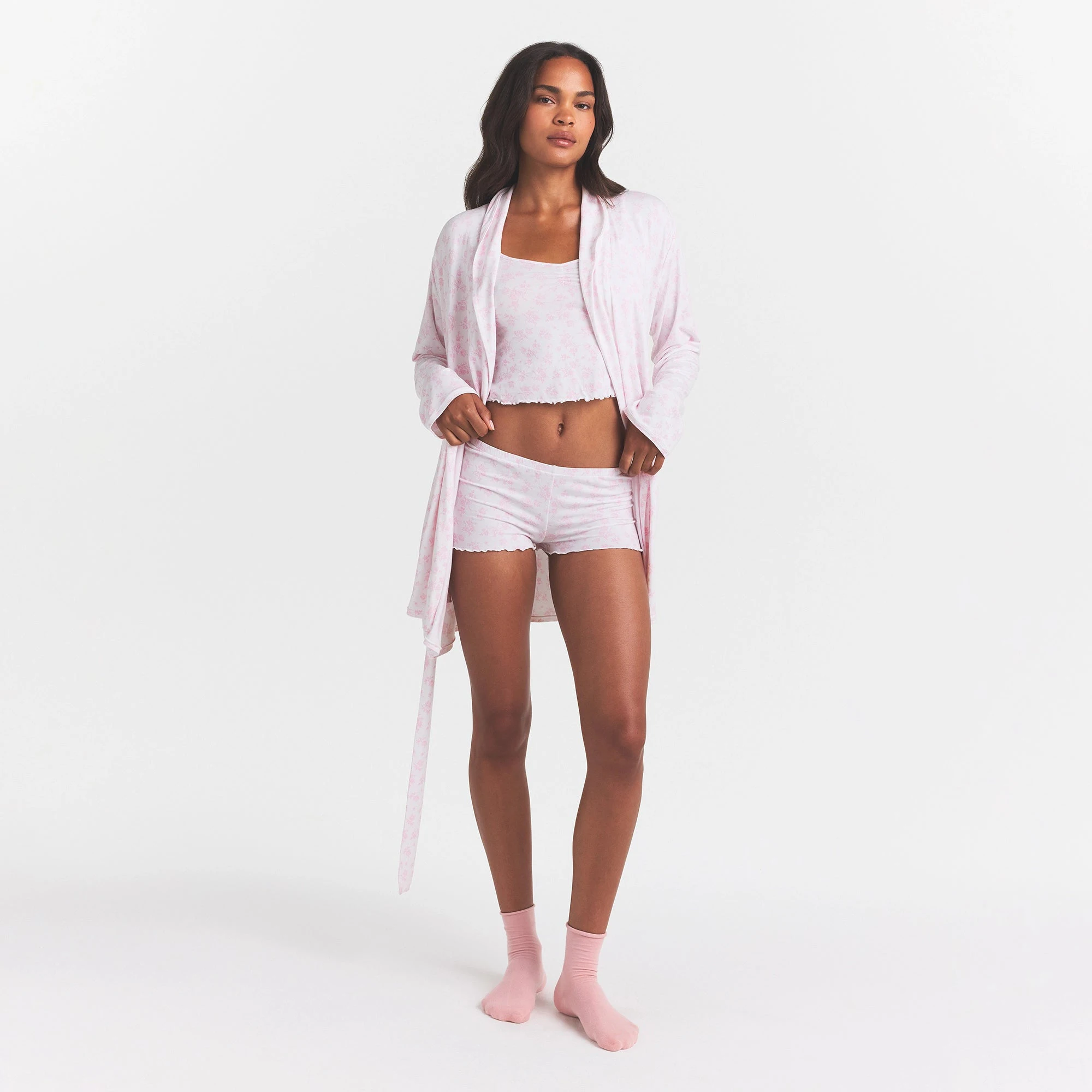 SKIMS SLEEP SHORT ROBE | SNOW DELICATE FLORAL PRINT ON A MODEL FRONT VIEW