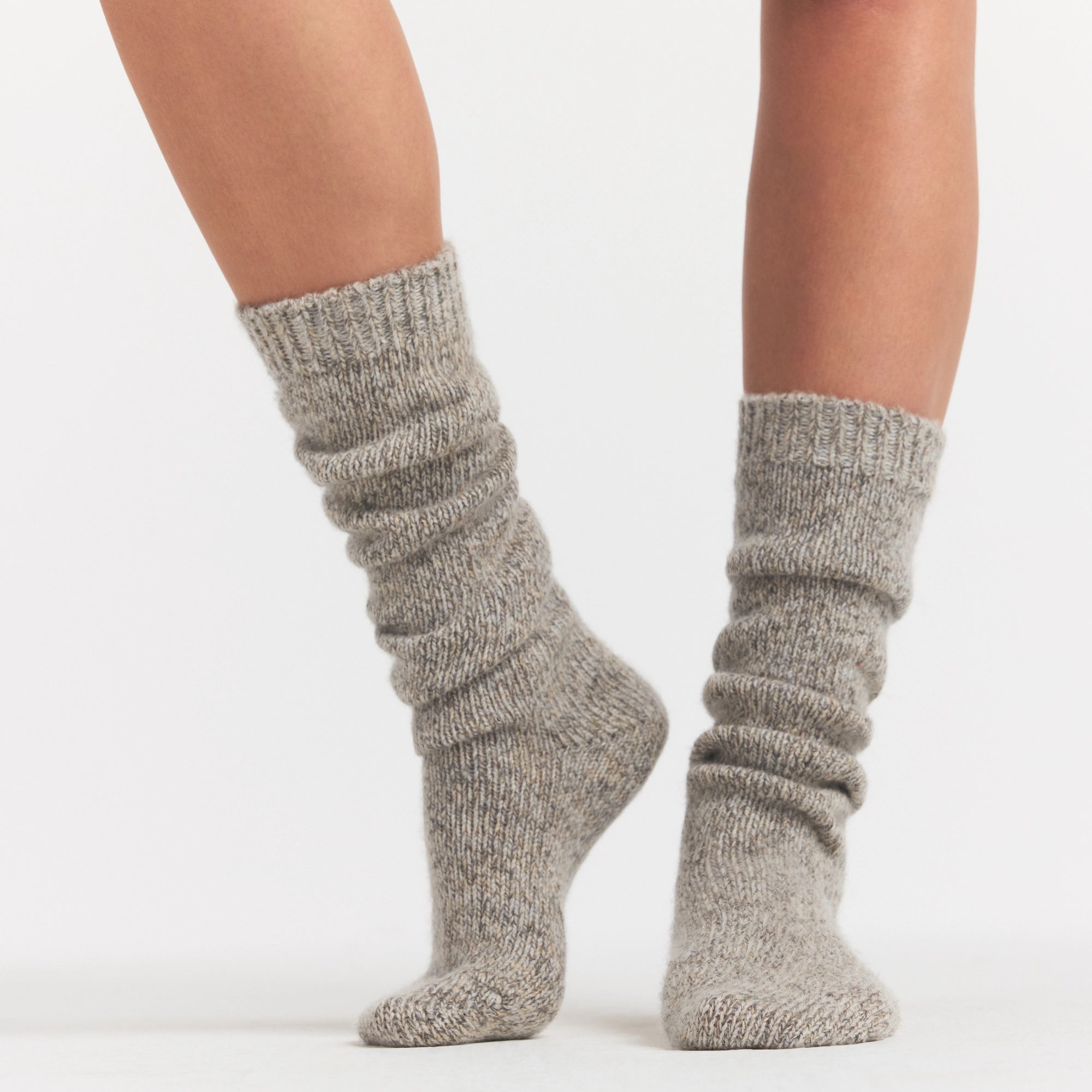 TWEED KNIT SLOUCH SOCK | LATTE ON A MODEL SIDE VIEW @ | FOCUS: 0.0, 1.0, 0.9