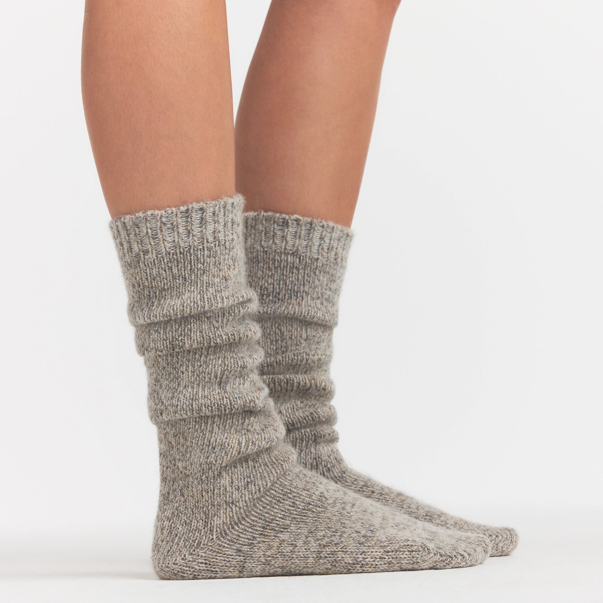 TWEED KNIT SLOUCH SOCK | LATTE ON A MODEL SIDE VIEW @ | FOCUS: 0.0, 1.0, 0.9