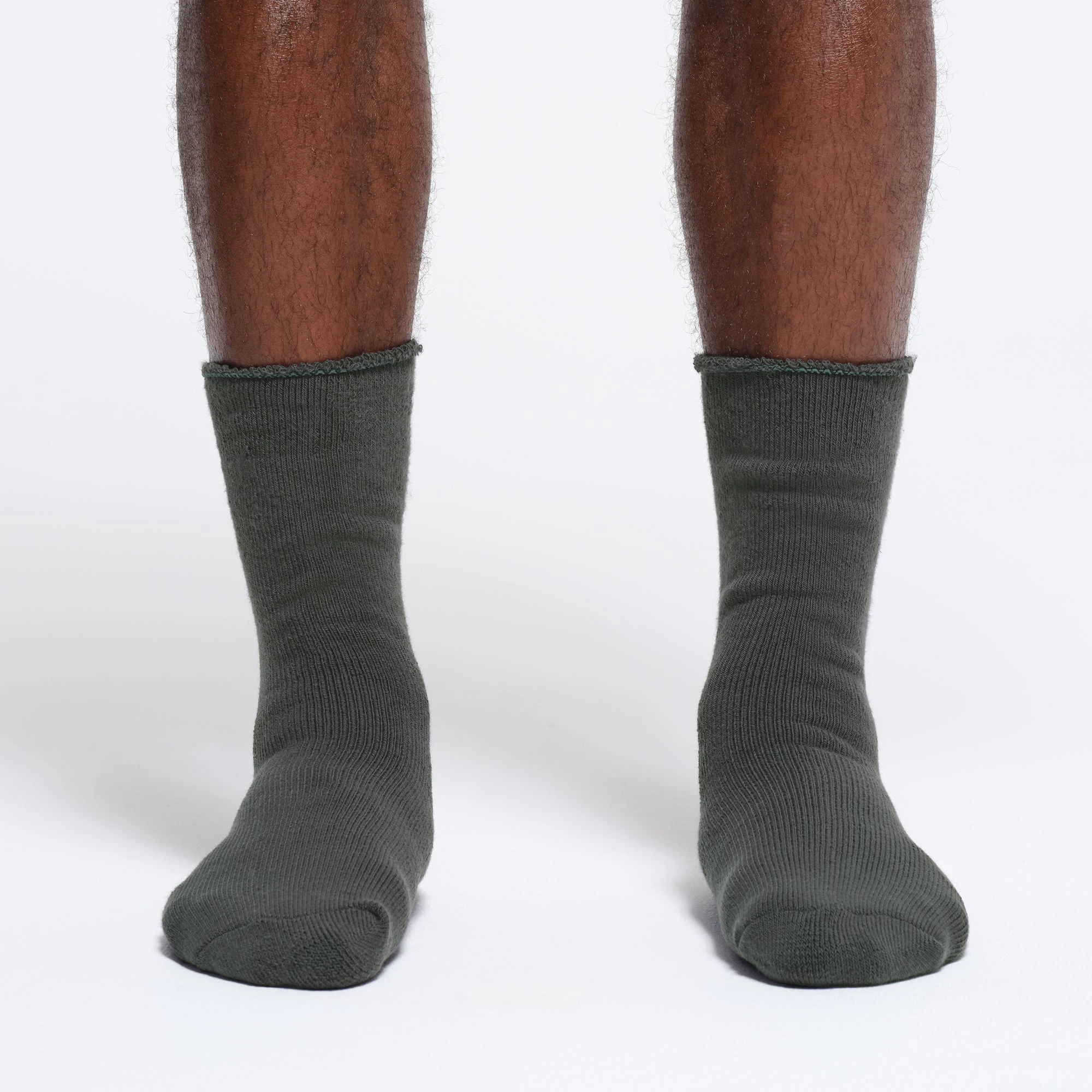 MENS LOUNGE SOCK | DEEP SEA ON A MODEL FRONT VIEW