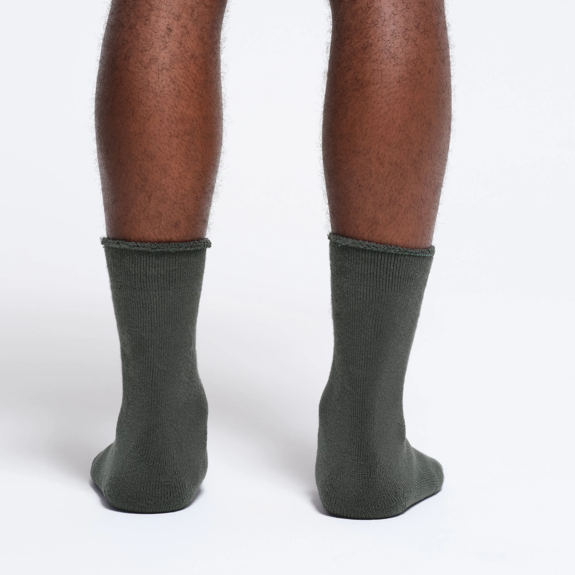 MENS LOUNGE SOCK | DEEP SEA ON A MODEL BACK VIEW