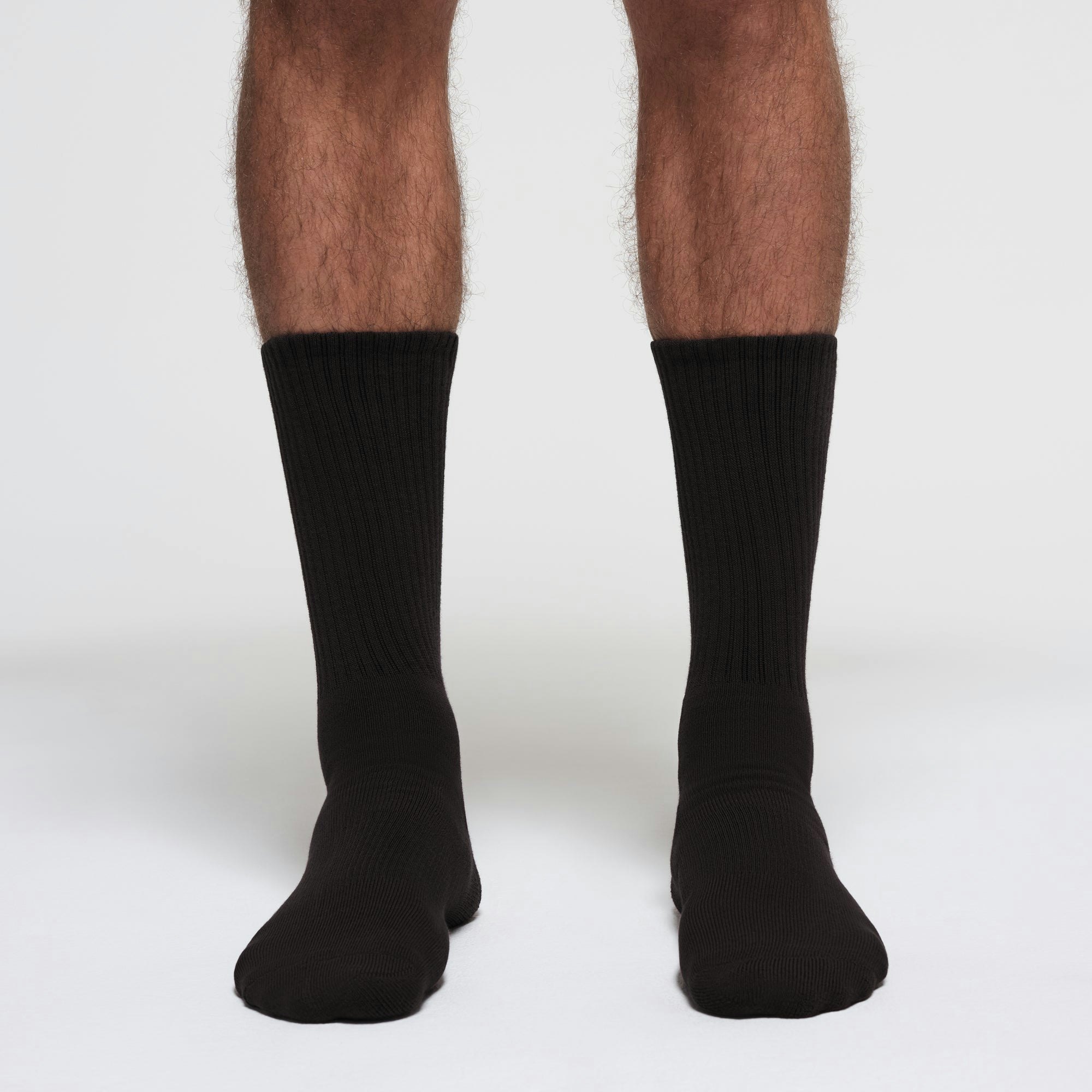 MENS TUBE CREW SOCK 3-PACK | ONYX ON A MODEL FRONT VIEW