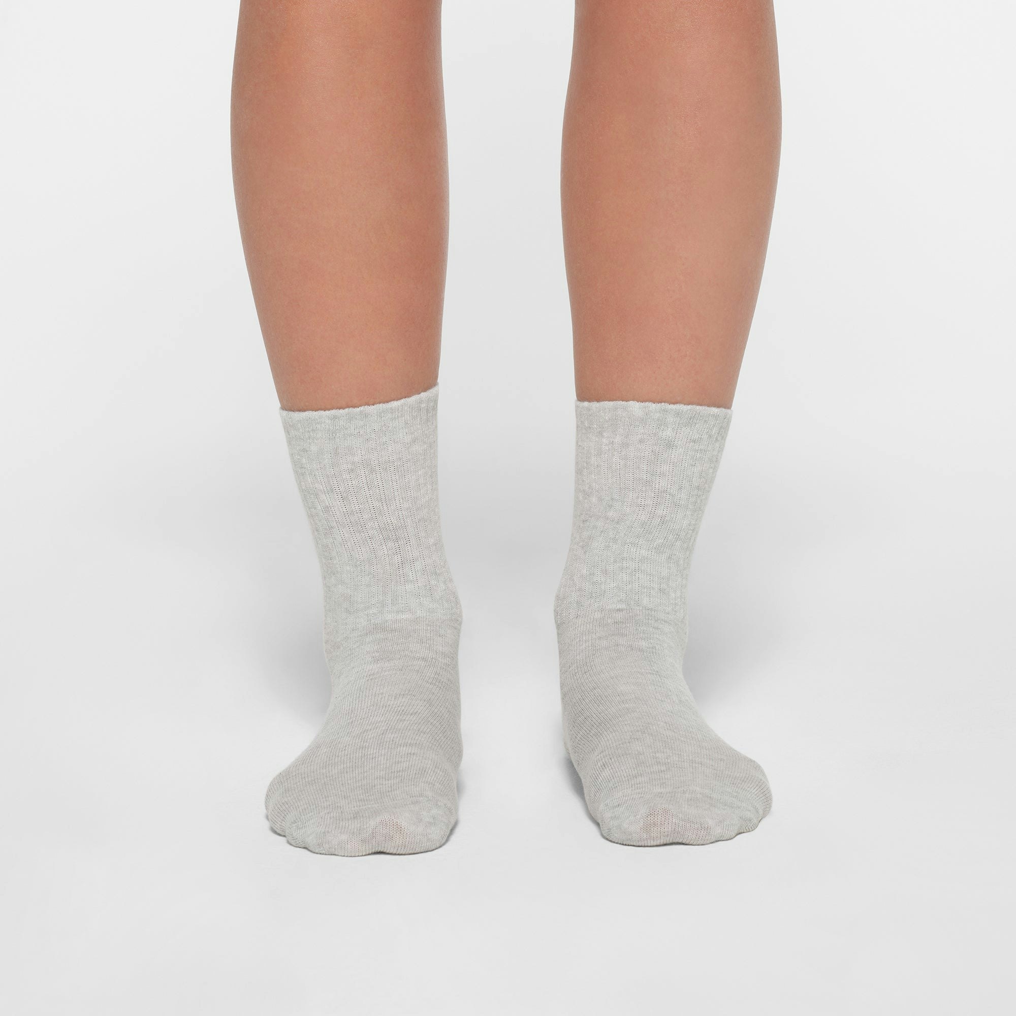 SPORT CREW SOCK 3-PACK | CORE MULTI ON A MODEL FRONT VIEW
