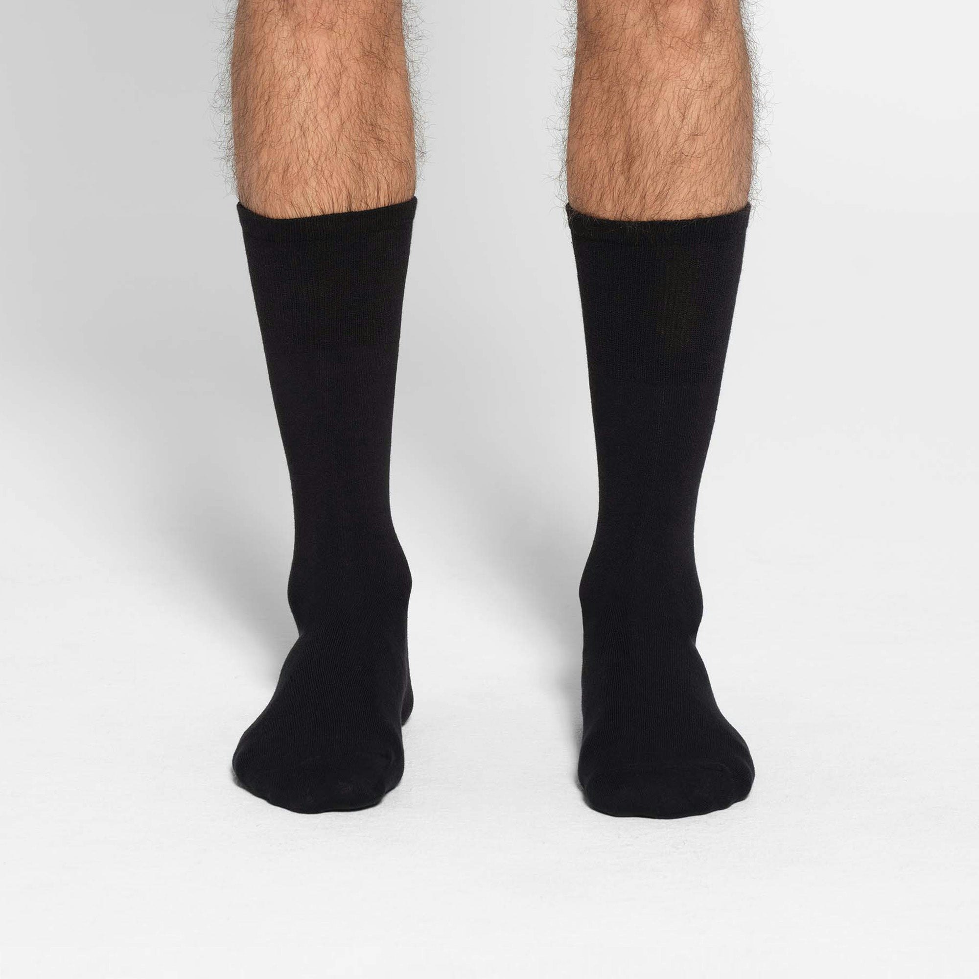 MENS DAY SOCK 3-PACK | OBSIDIAN ON A MODEL FRONT VIEW