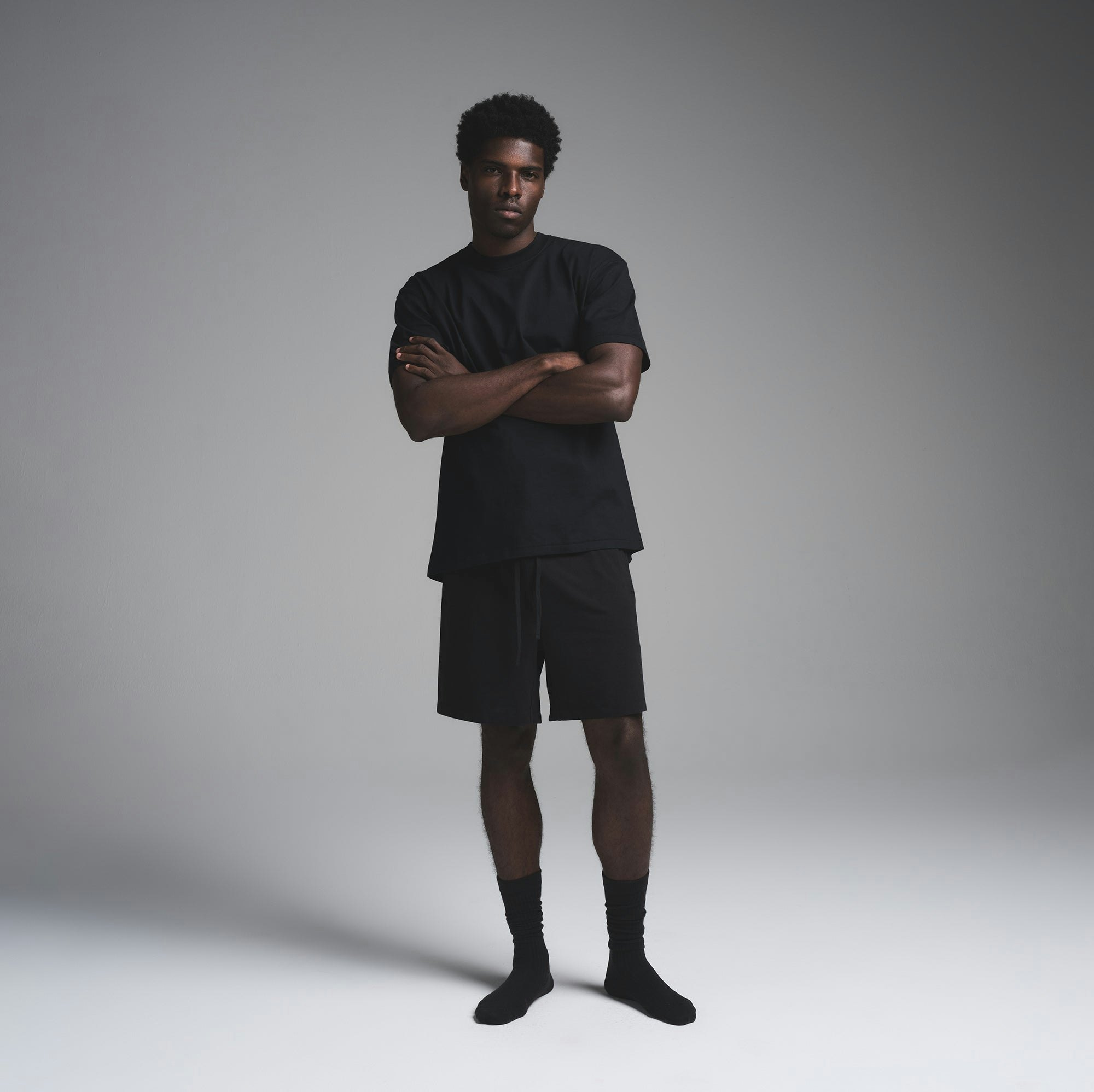 MENS SLOUCH SOCK | OBSIDIAN ON A MODEL FRONT VIEW