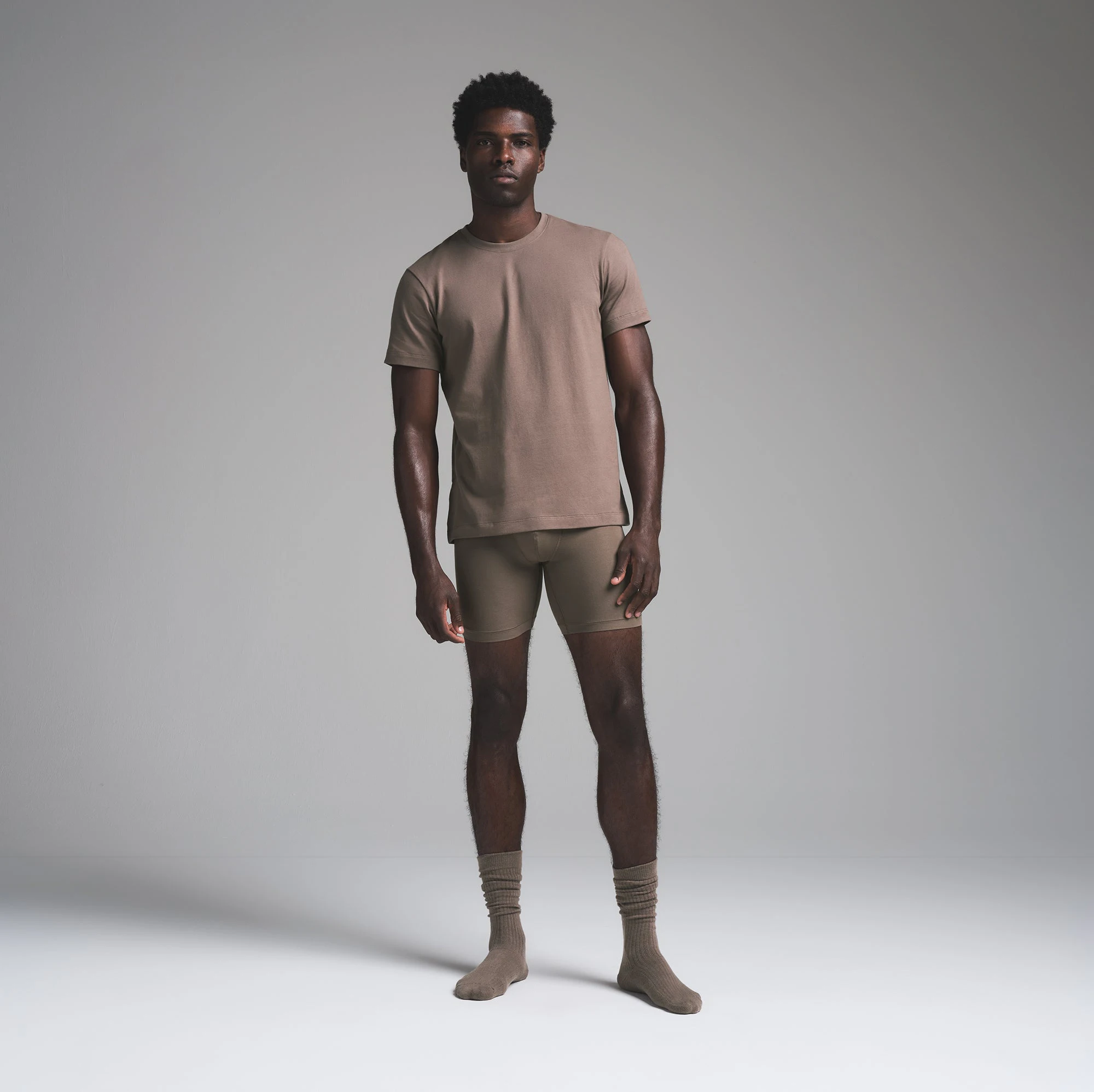 MENS SLOUCH SOCK | TRUFFLE ON A MODEL FRONT VIEW 