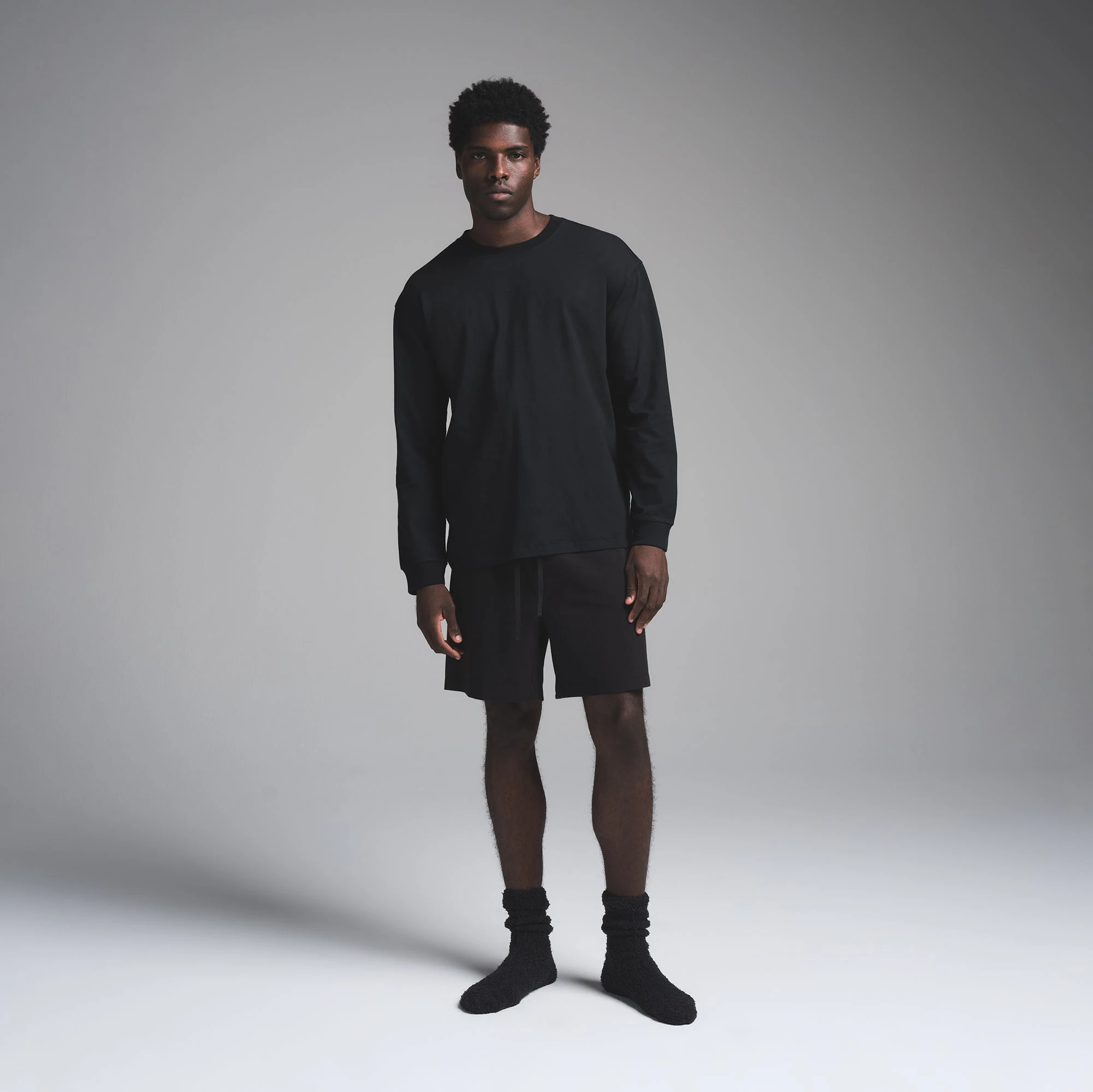 COZY KNIT MENS SOCK | ONYX ON A MODEL FRONT VIEW | FOCUS: 0.0, 1.0, 0.9