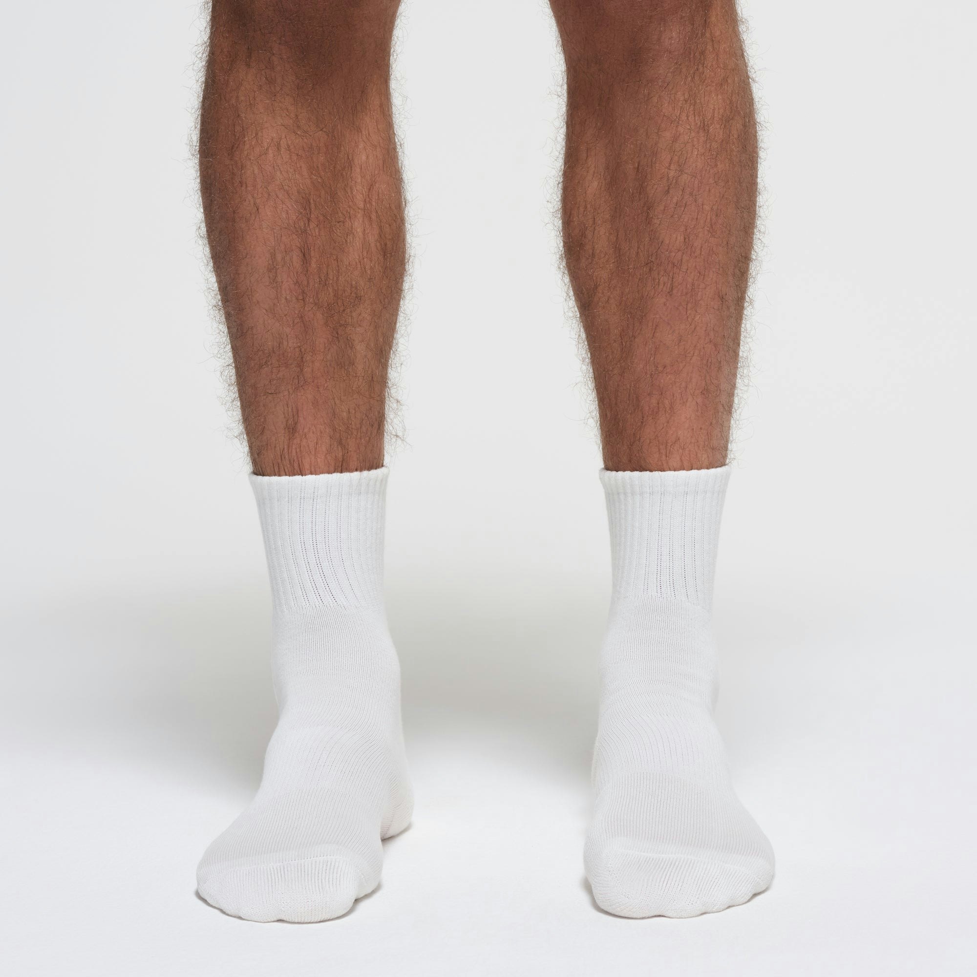 MENS EVERYDAY QUARTER CREW SOCK 3-PACK | CHALK ON A MODEL FRONT VIEW