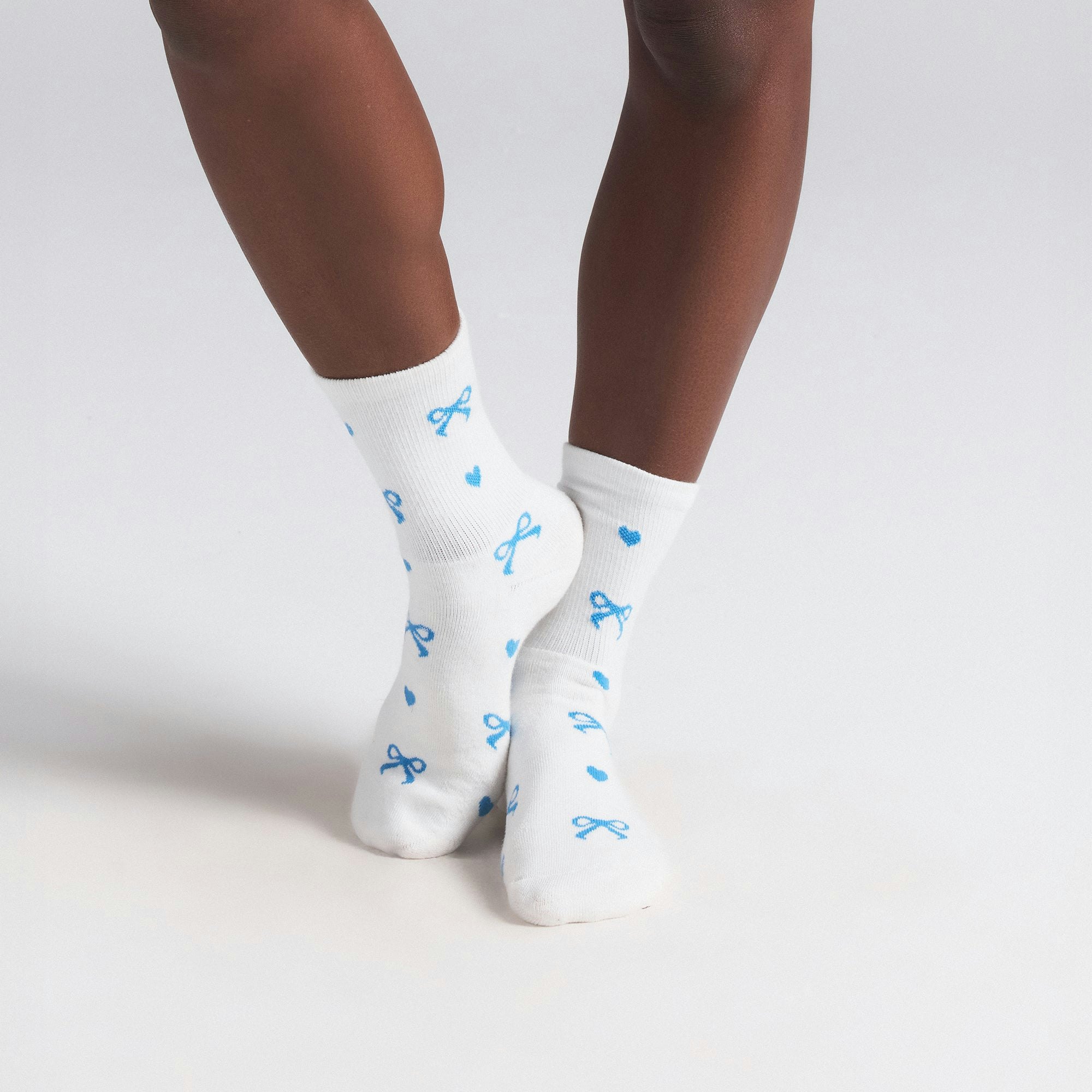 WEDDING SOCK 2-PACK | MARBLE AND CLOUD BOW PRINT ON A MODEL SIDE VIEW | FOCUS: 0.0, 1.0, 0.9