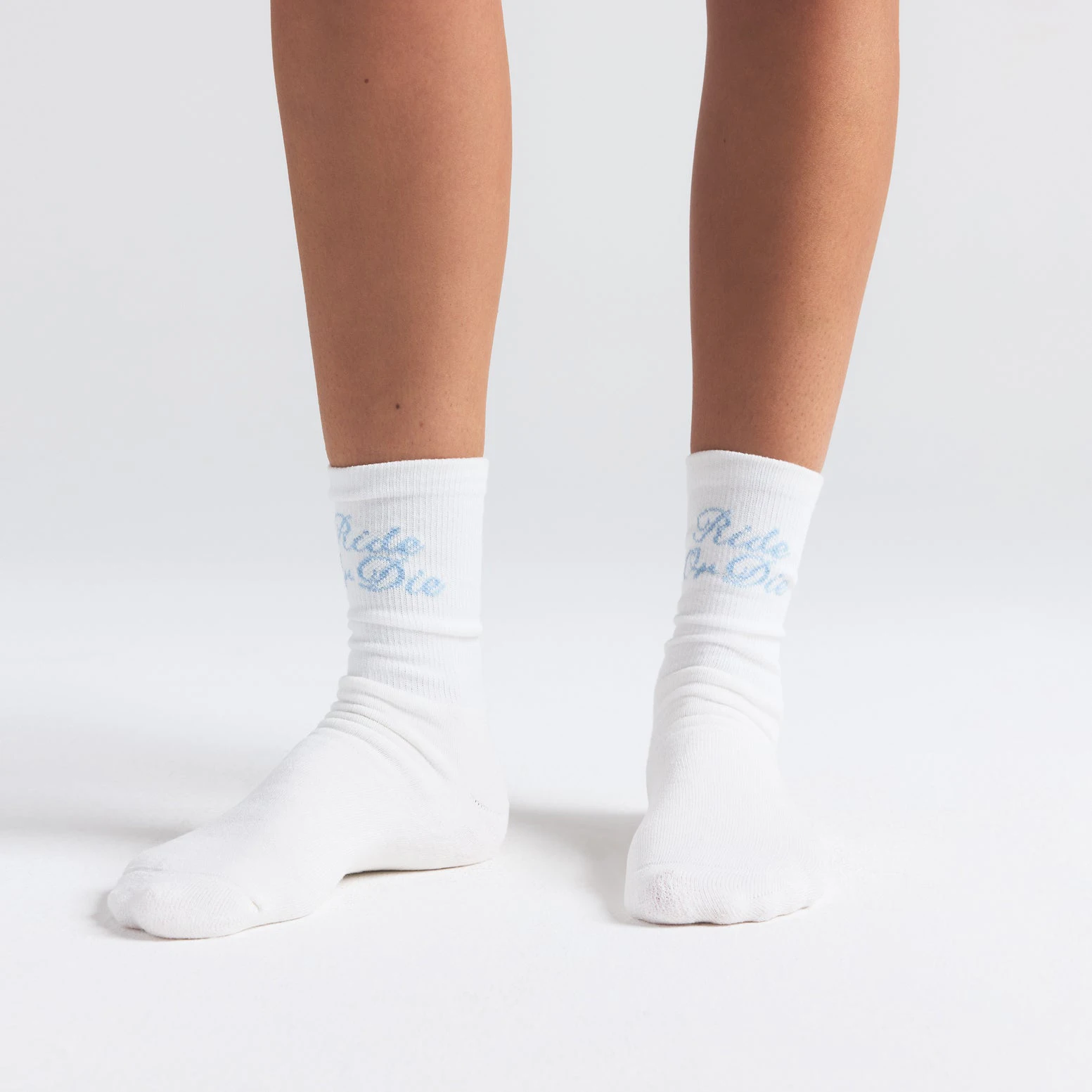 WEDDING SOCK 2-PACK | MARBLE AND CLOUD BOW PRINT ON A MODEL SIDE VIEW | FOCUS: 0.0, 1.0, 0.9