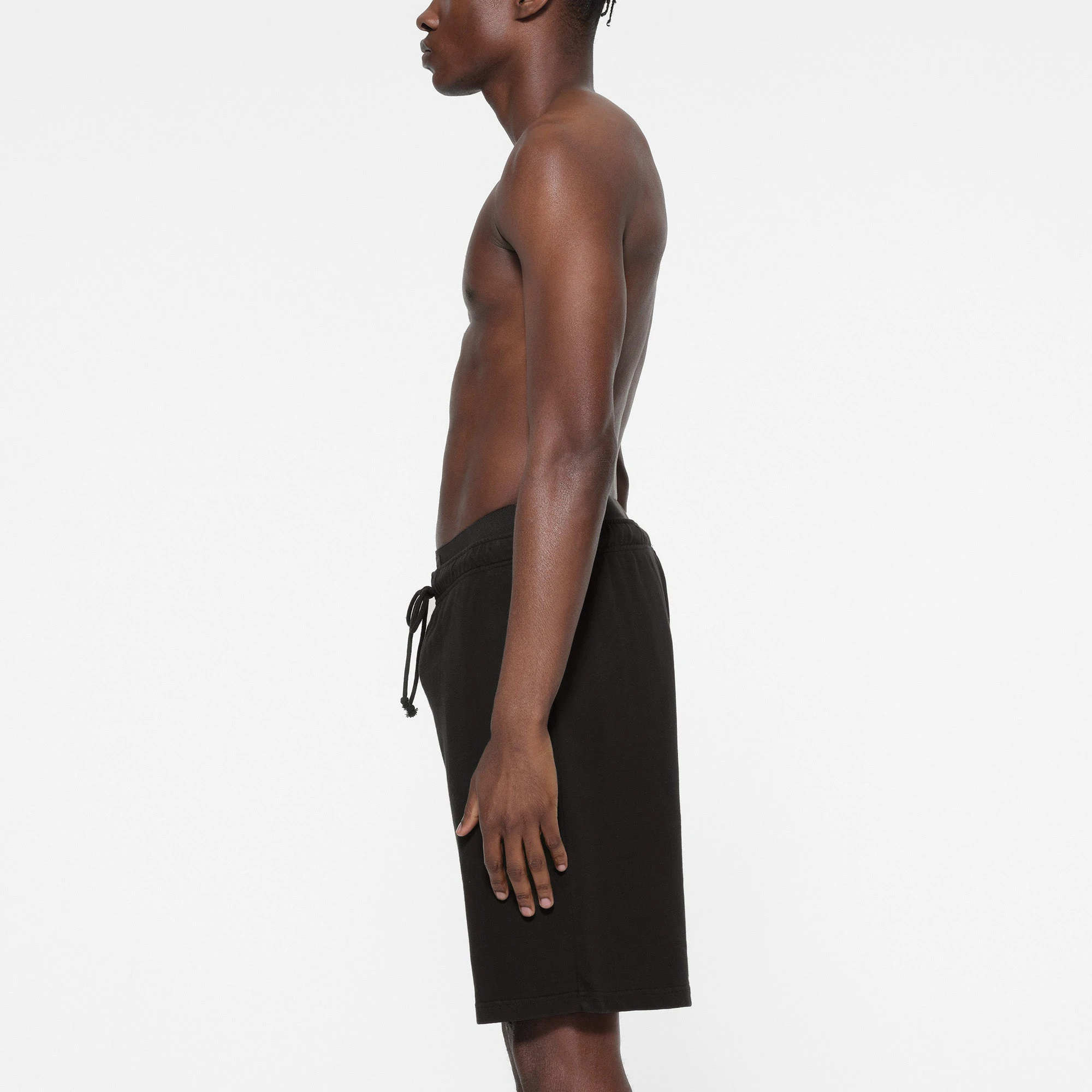 TERRY MENS LONG SHORT | WASHED OBSIDIAN ON A MODEL SIDE VIEW