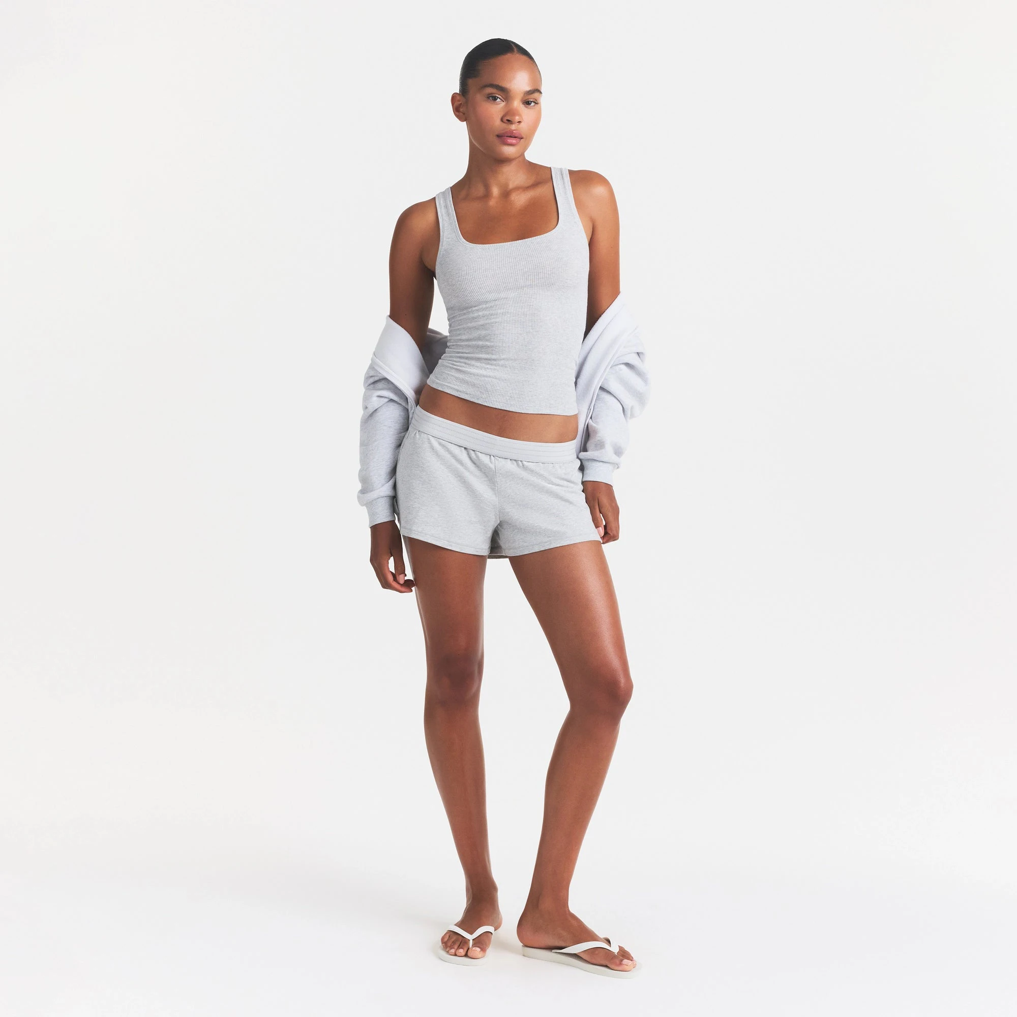 COTTON JERSEY LOOSE SHORT | LIGHT HEATHER GREY ON A MODEL FRONT VIEW @ | FOCUS: 0.0, 1.0, 0.9