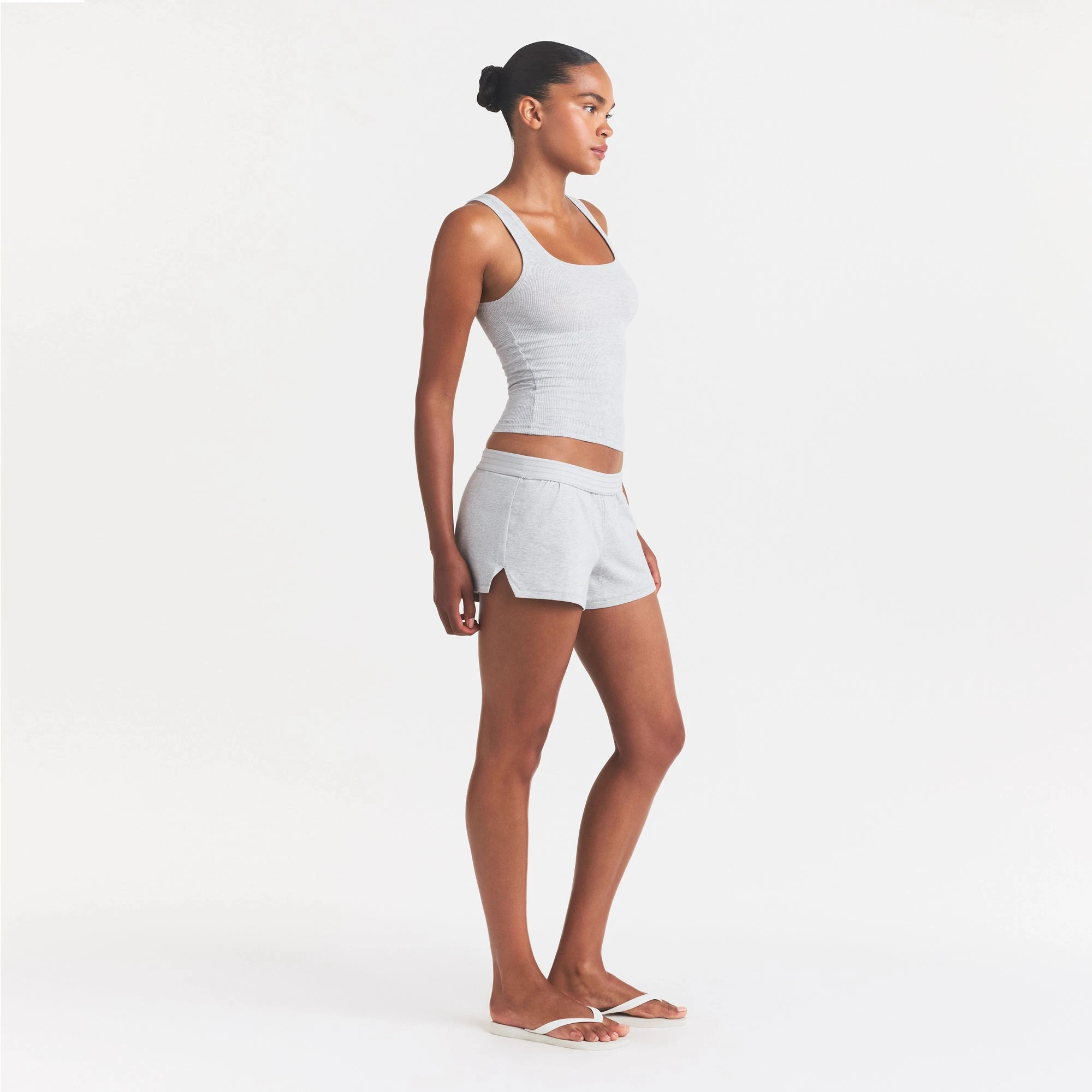 COTTON JERSEY LOOSE SHORT | LIGHT HEATHER GREY ON A MODEL FRONT VIEW @ | FOCUS: 0.0, 1.0, 0.9