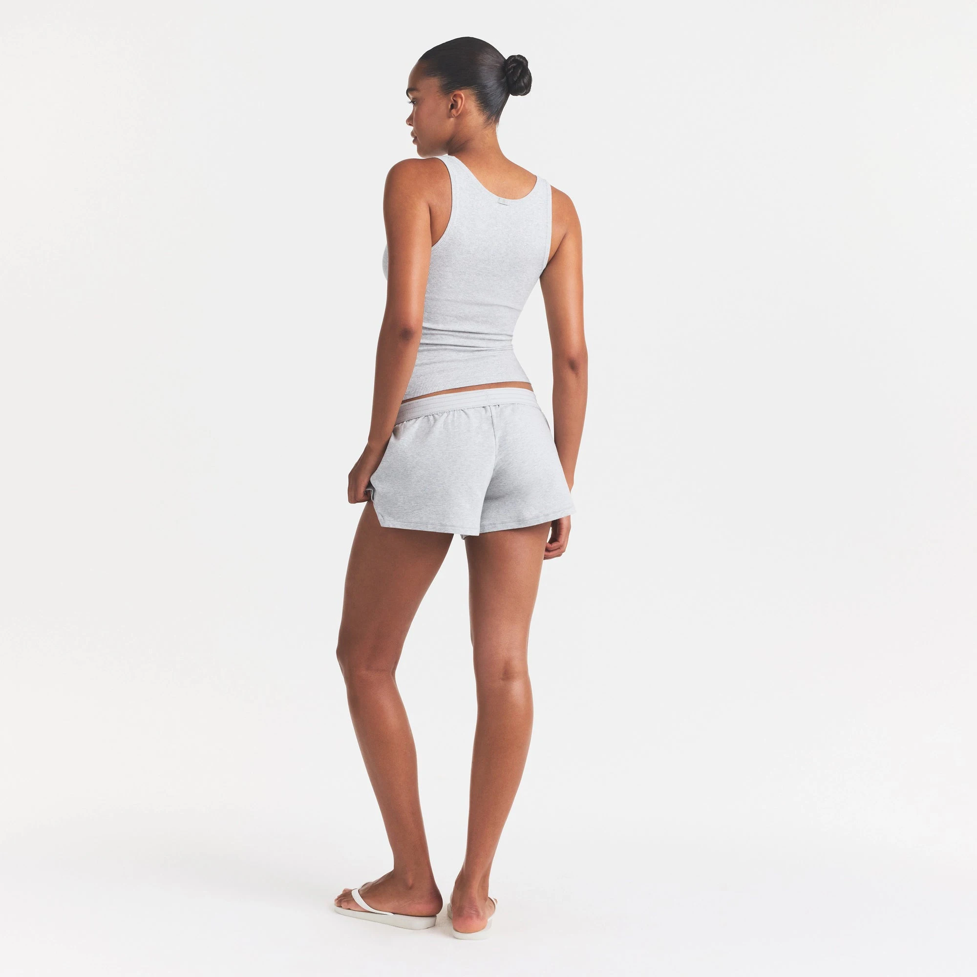 COTTON JERSEY LOOSE SHORT | LIGHT HEATHER GREY ON A MODEL FRONT VIEW @ | FOCUS: 0.0, 1.0, 0.9